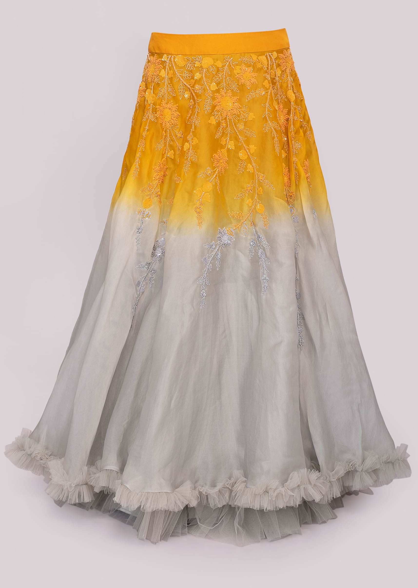 Mustard and grey  shades lehenga paired with strapless blouse and  frilled dupatta