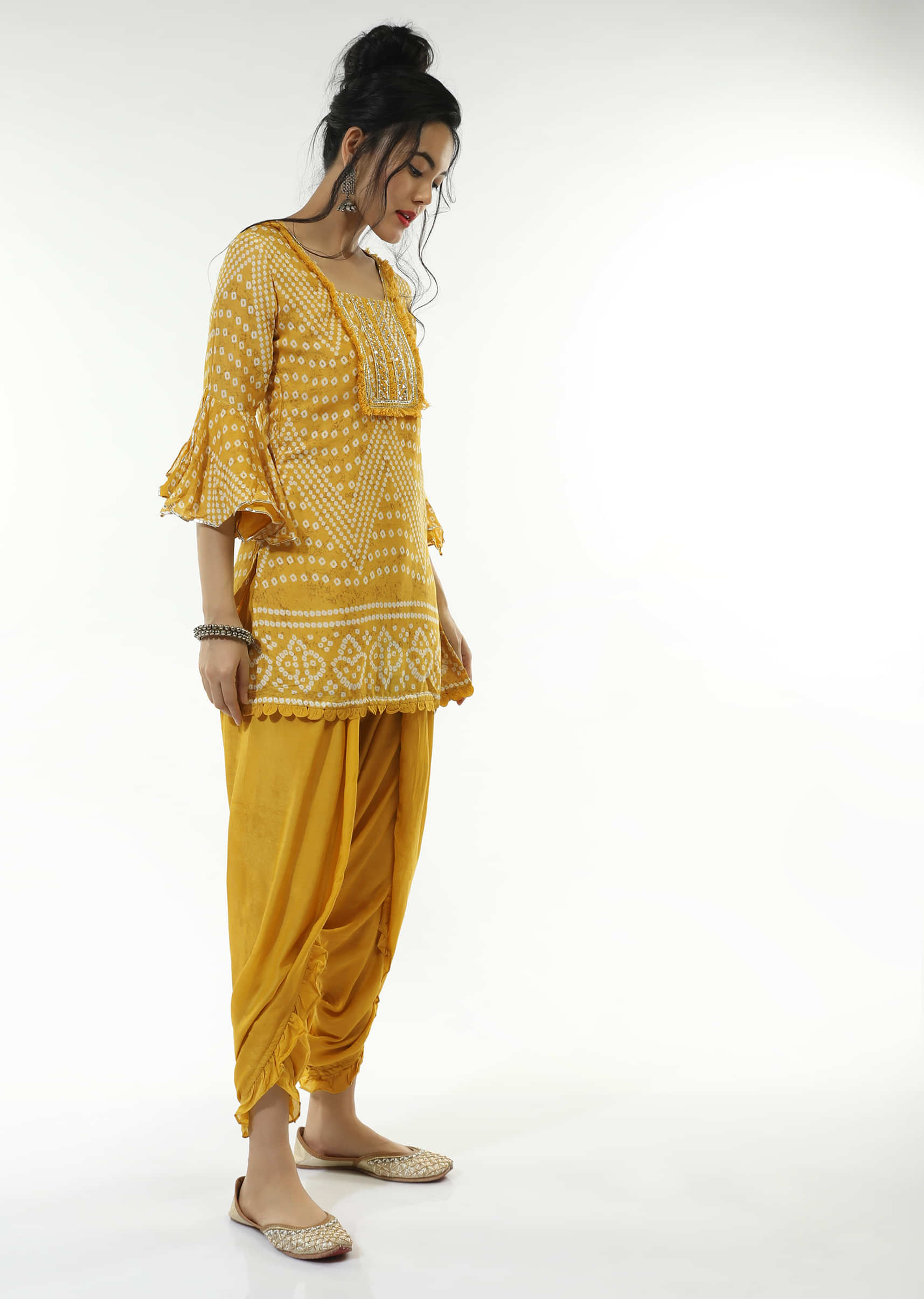 Mustard Dhoti Suit In Cotton With Bandhani Print And Ruffle Sleeves  