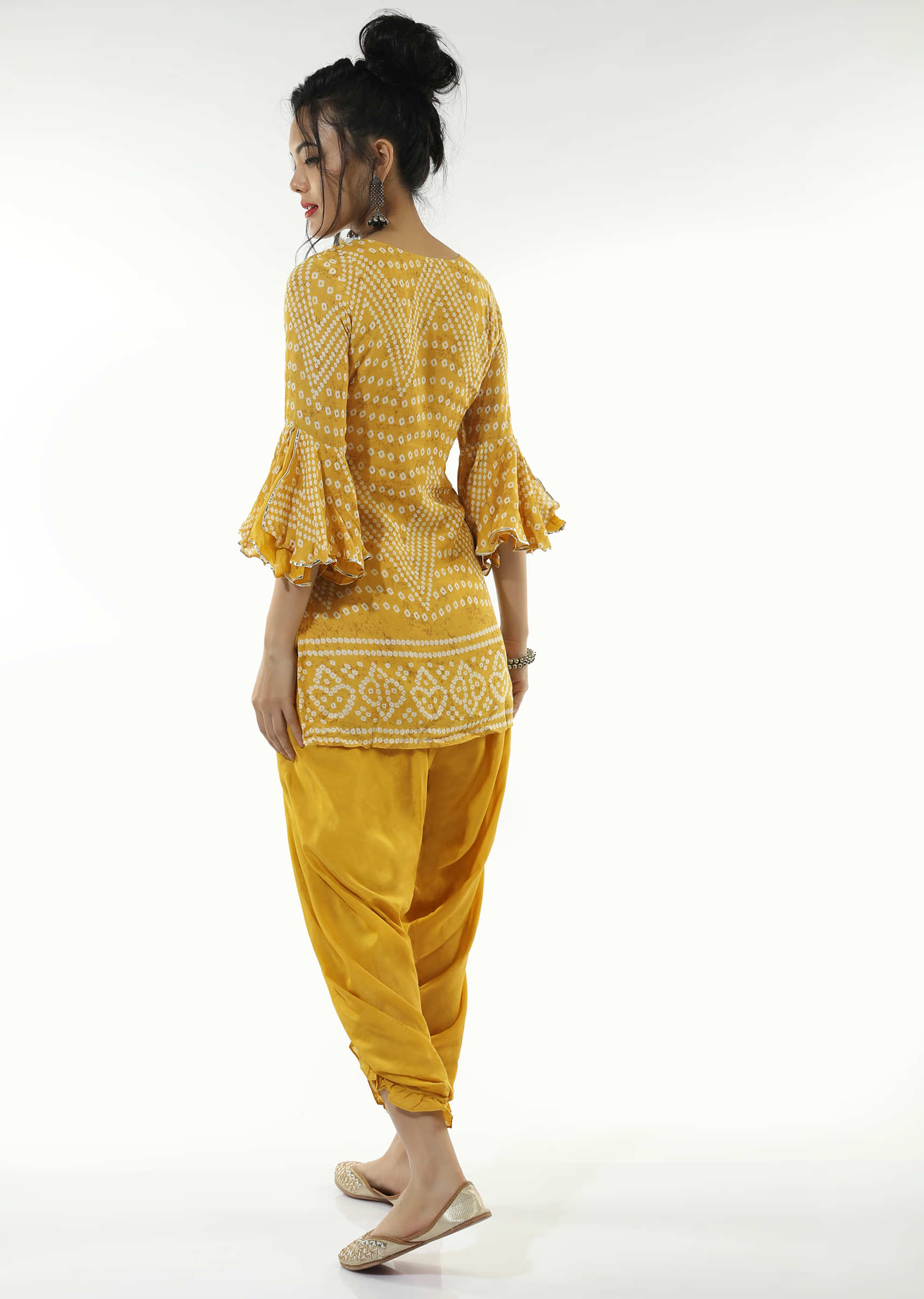 Mustard Dhoti Suit In Cotton With Bandhani Print And Ruffle Sleeves  