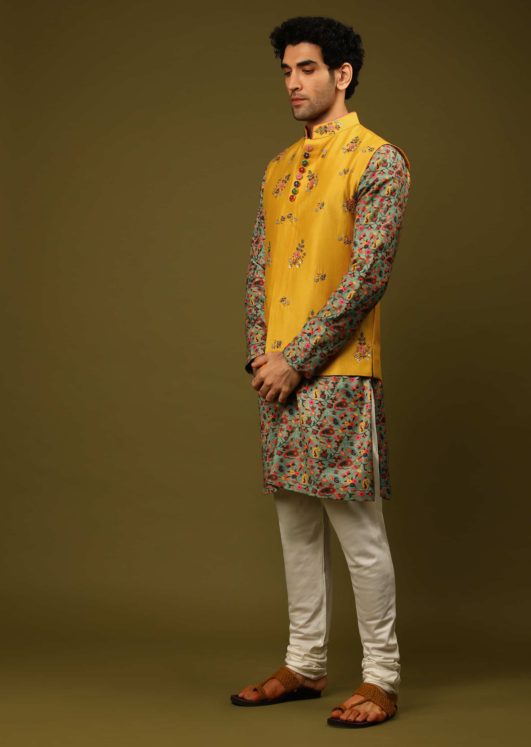 Mustard Nehru Jacket With Colorful Resham Embroidered Floral Motifs And Contrasting Floral Printed Kurta Set  