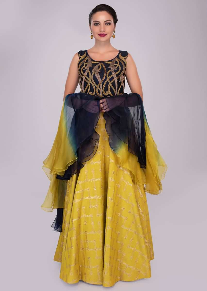 Mustard skirt paired with persian blue sequins embroidered blouse and ruffled organza dupatta