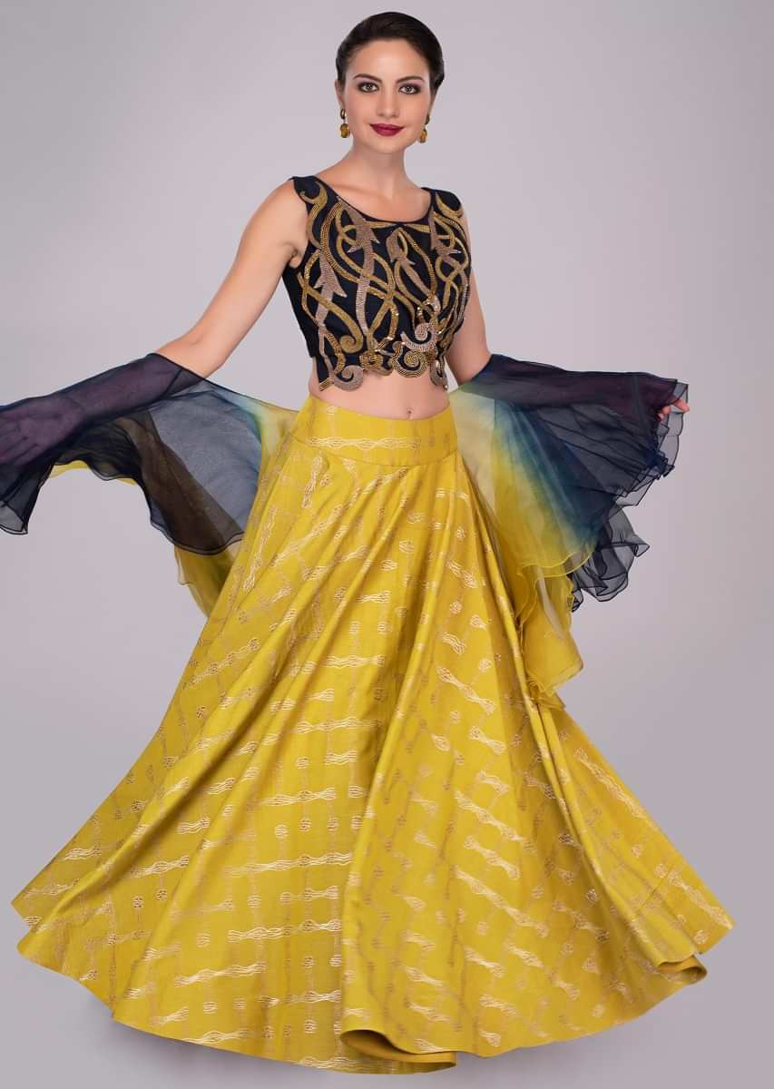 Mustard skirt paired with persian blue sequins embroidered blouse and ruffled organza dupatta