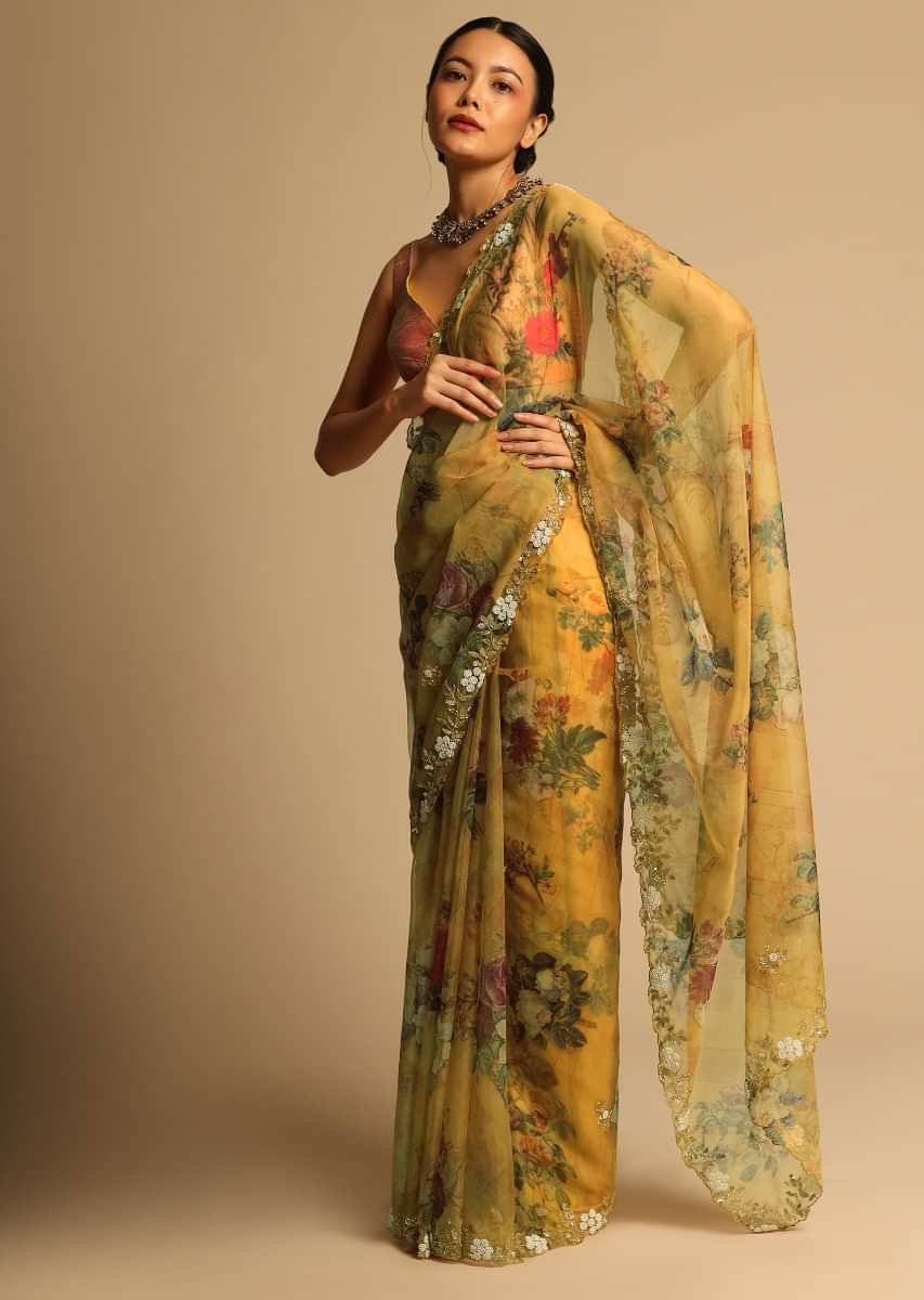 Mustard Yellow Saree In Organza With Floral Print All Over And Moti Embroidered Border Along With Unstitched Blouse