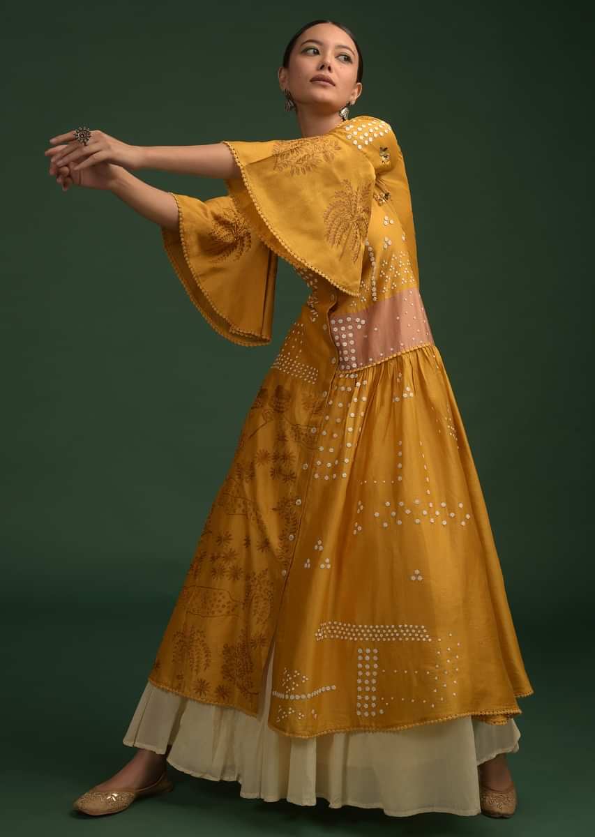 Mustard Yellow Tunic In Cotton With Frill On The Side And Adorned With Flower Sequins And Thread Work 