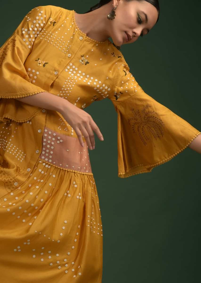 Mustard Yellow Tunic In Cotton With Frill On The Side And Adorned With Flower Sequins And Thread Work 