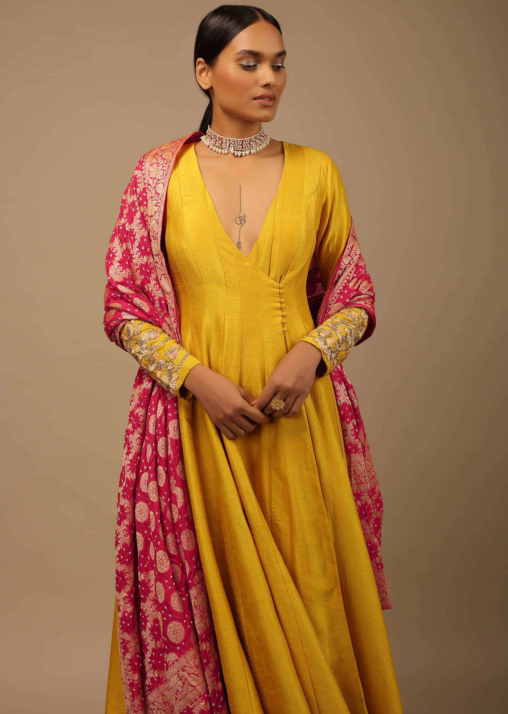 Mustard Angrakha Suit In Raw Silk With Hand Embroidery And A Contrasting Brocade Dupatta Enhanced With Bandhani 