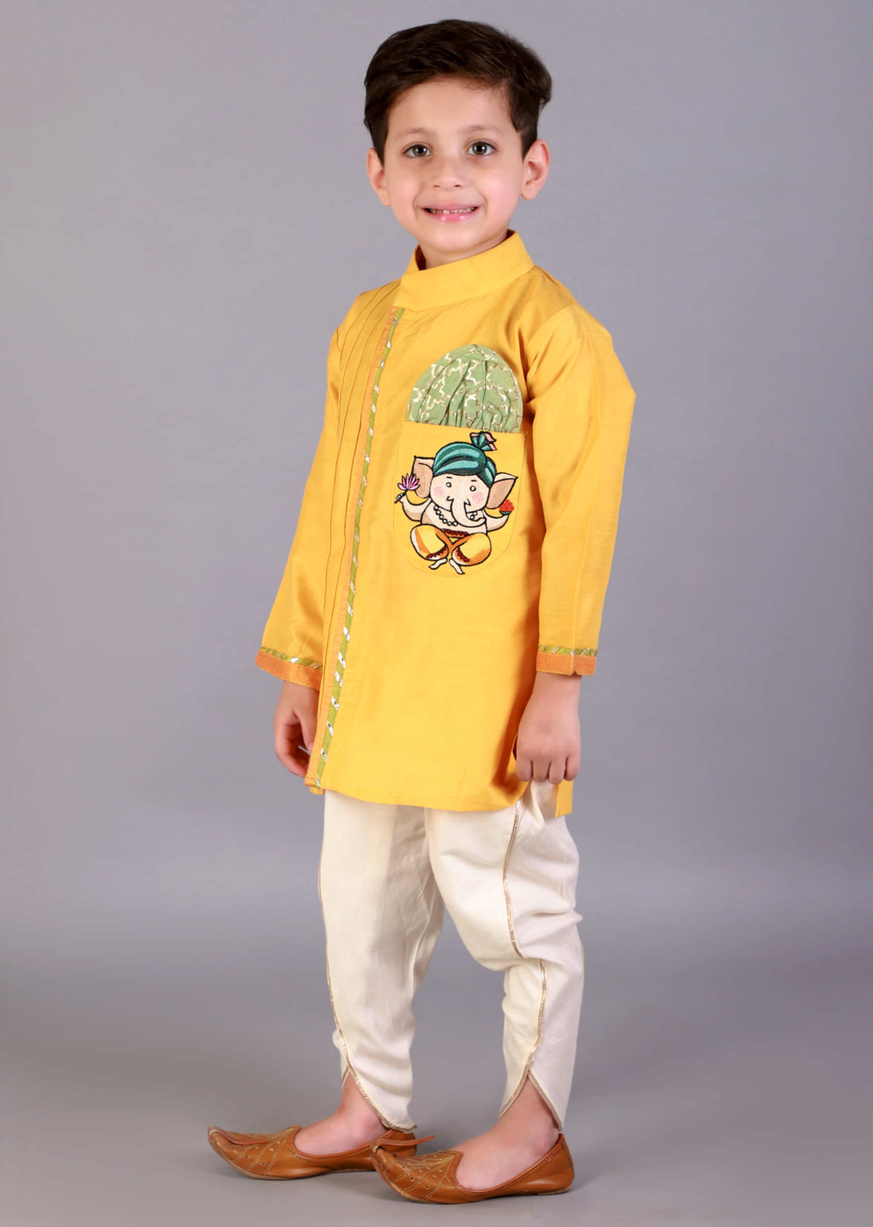 Kalki Boys Mustard Kurta Set In Cotton Silk With Embroidered Ganpati And Gotta Work