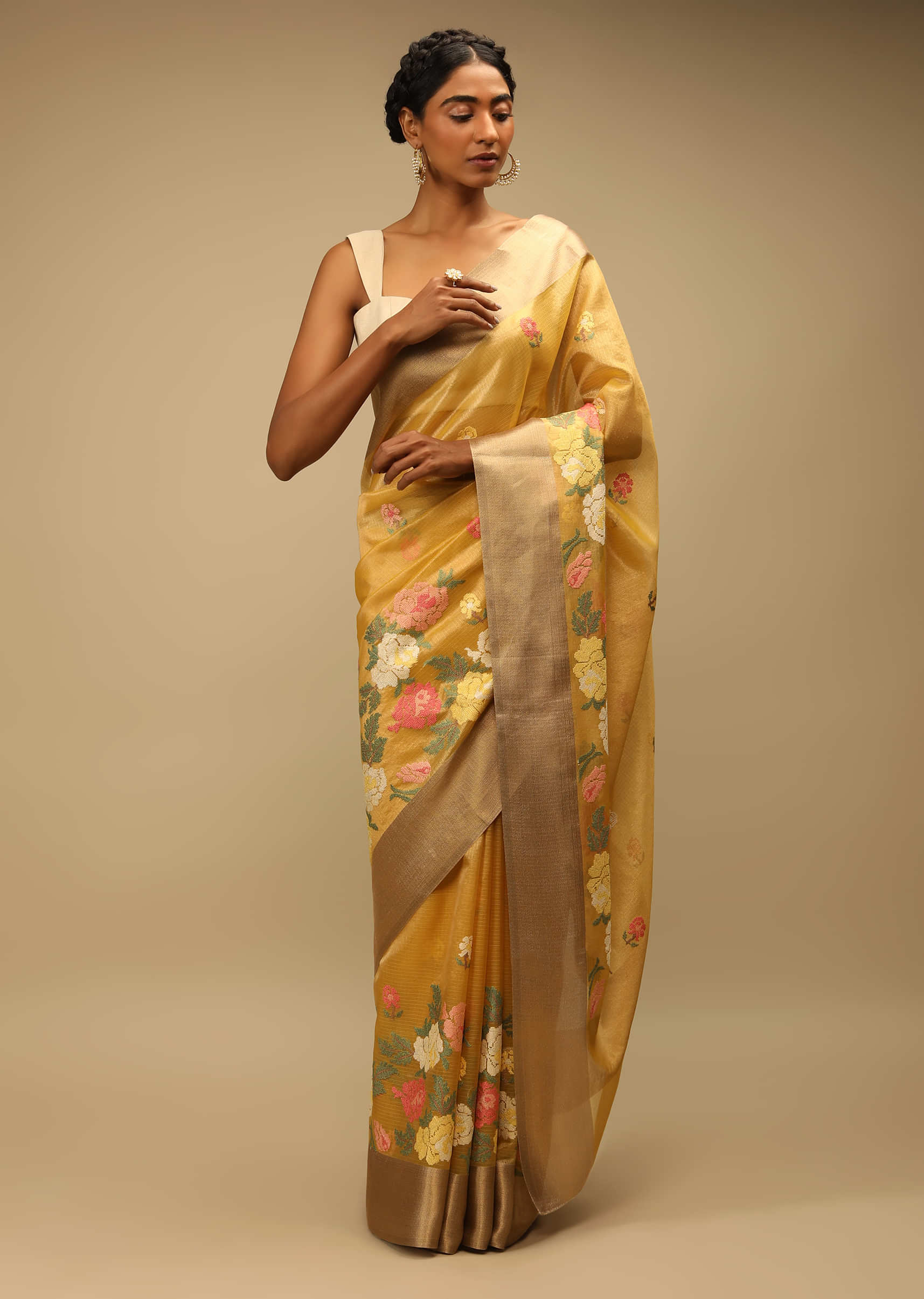 Mustard Saree In Zari Kota Silk With Multi Colored Resham Embroidered Flowers On The Border  