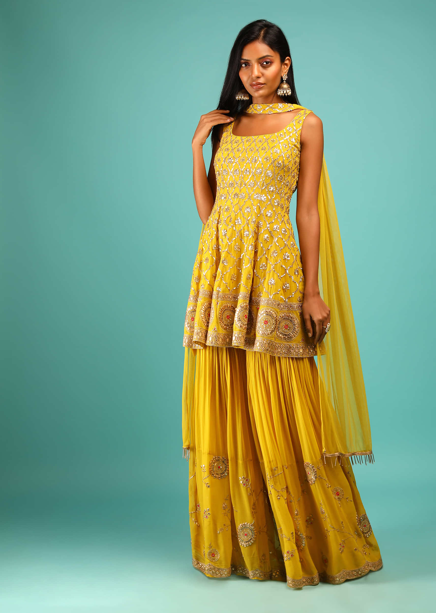 Mustard Sharara And Peplum Suit With Moroccan Jaal Embroidery And Gotta Highlights