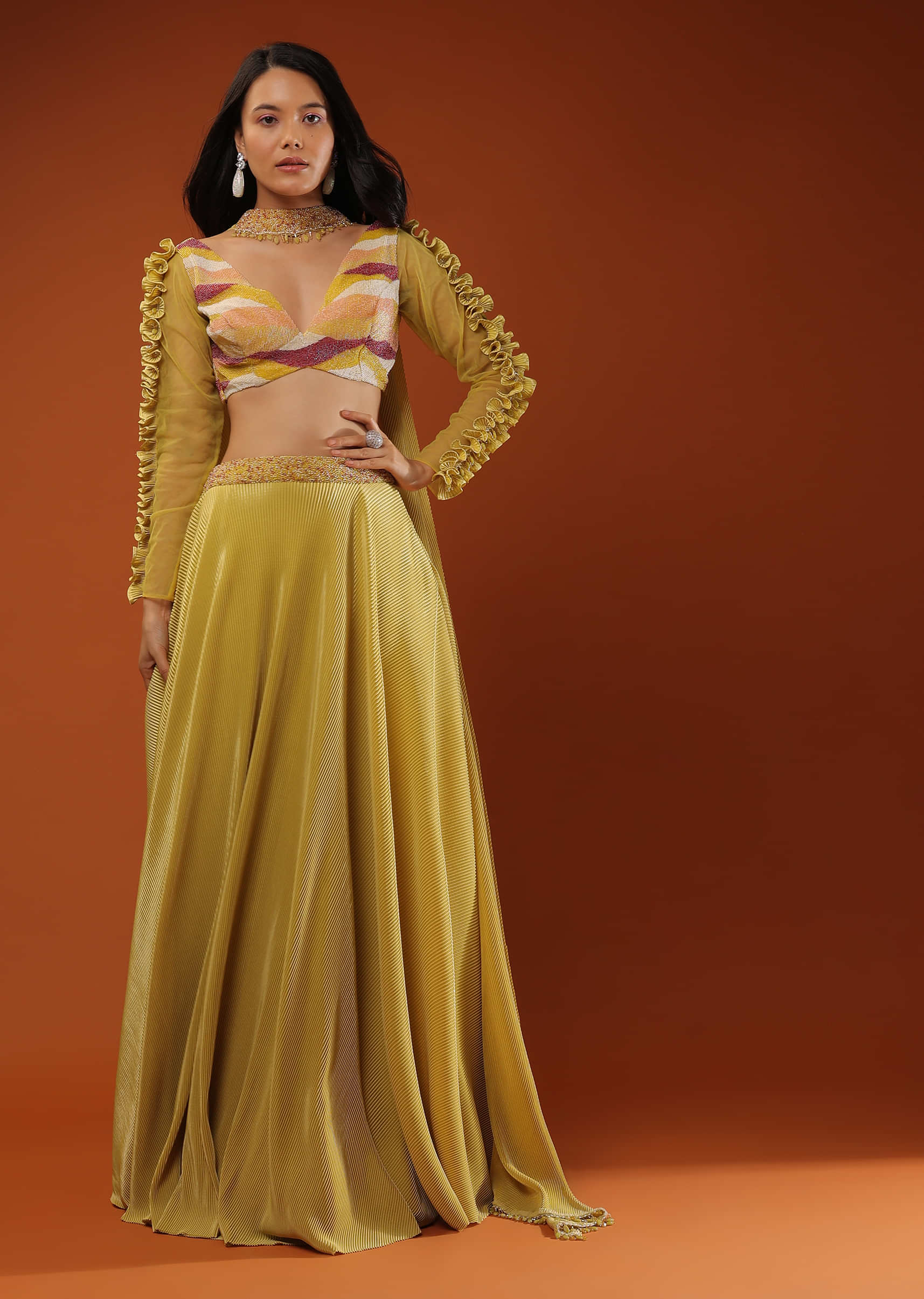 Mustard Yellow Lehenga And A Crop Top With Frills On The Top Of The Sleeves, Crafted In Crepe With Moti Embroidery