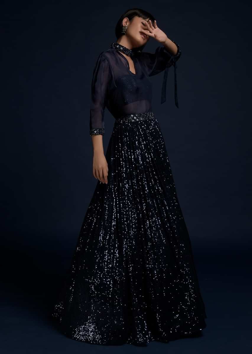 Navy Blue Lehenga Embellished In Sequins With A Matching Organza Top And Sequins Bustier