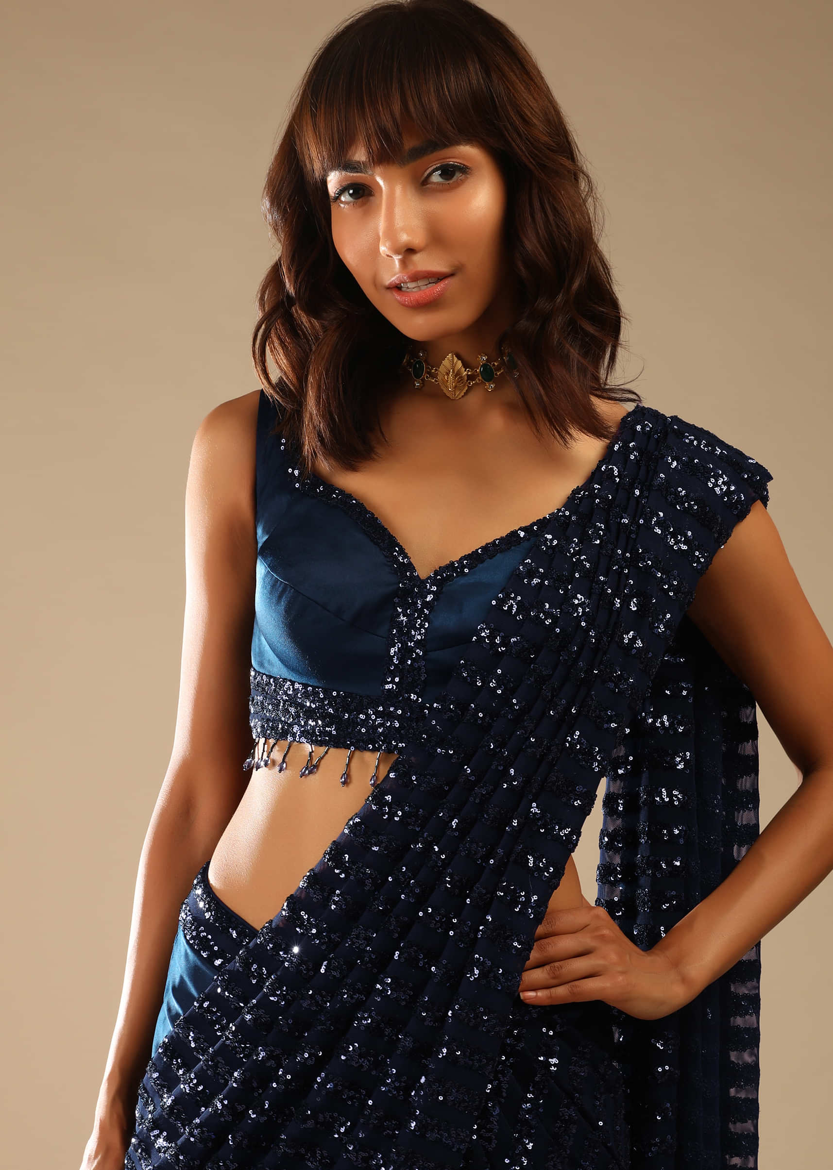 Navy Blue Ready Pleated Saree In Satin With Striped Sequins Pallu And A Sweetheart Neck Blouse With Bead Fringes Online - Kalki Fashion