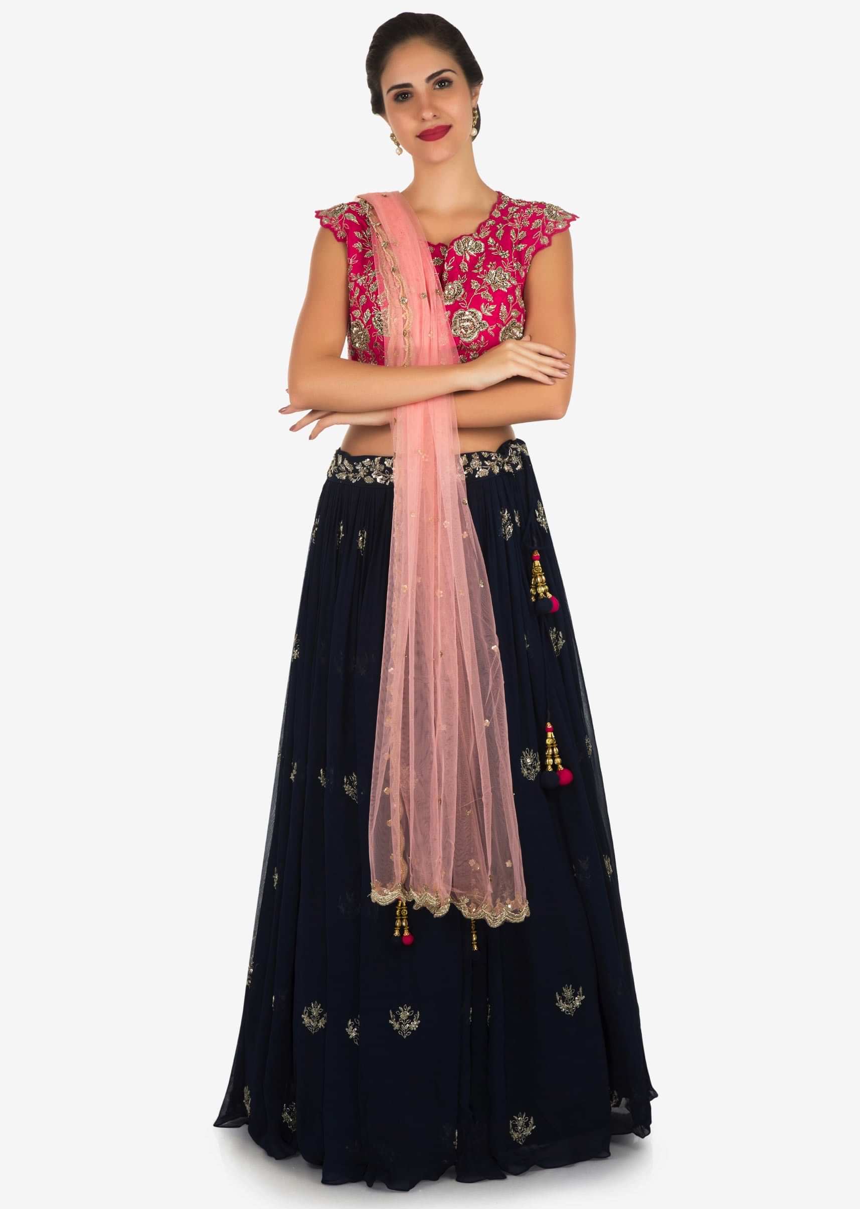 Navy blue and rani pink lehenga encrusted in zari and sequin embroidery work only on Kalki