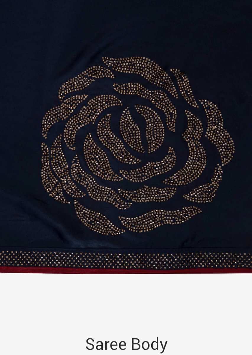 Navy blue and red saree in satin with unstitched blouse crafted in kundan embroidery work