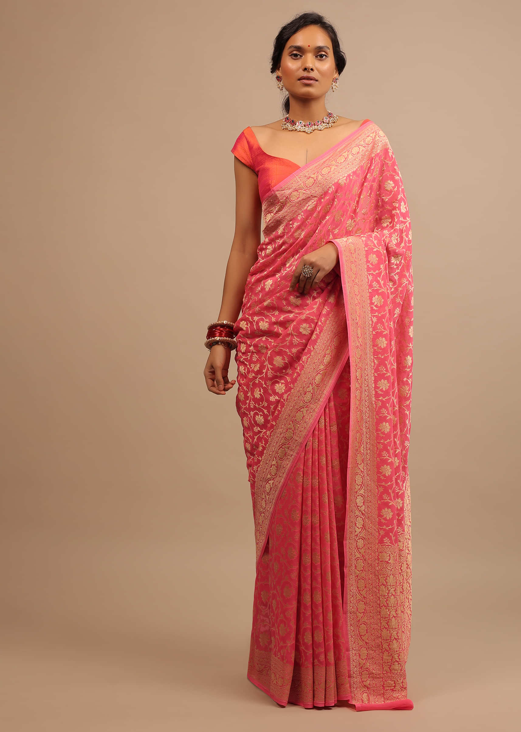 Neon Pink Traditional Georgette Saree With Golden Jaal Work In Floral Motif