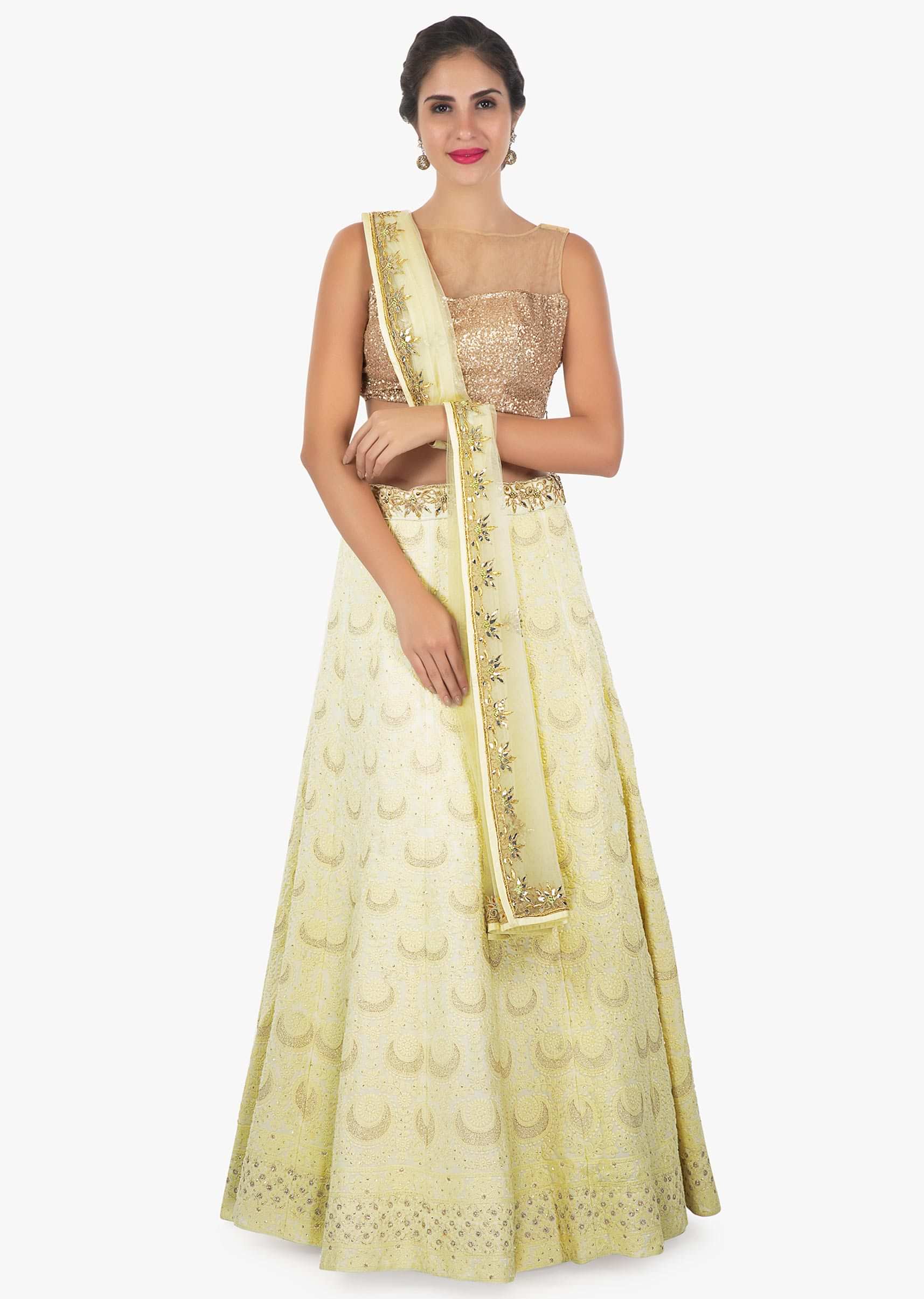 Nog yellow lehenga with thread work all over and a net dupatta with gotta patch only on Kalki