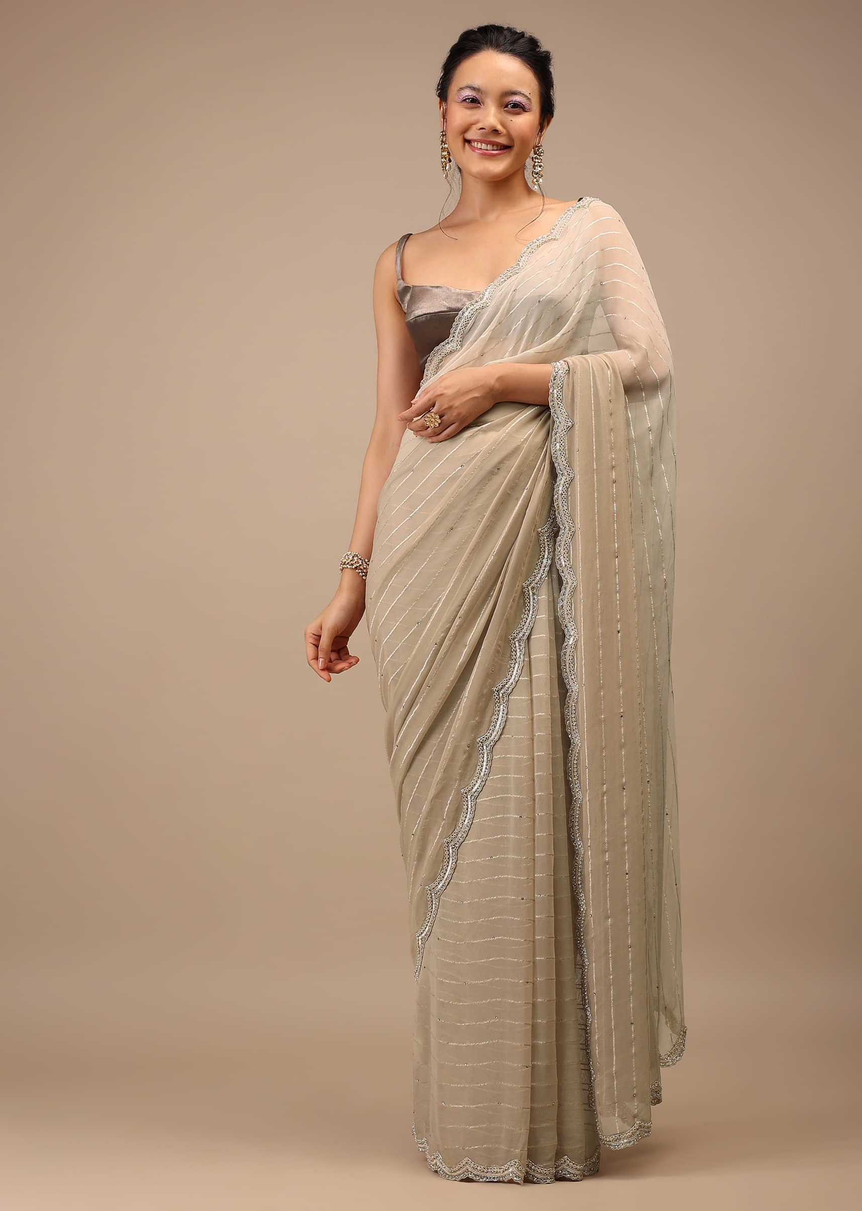 Nomad Georgette Saree With Borderline Cutwork And Leafy Motif Detailing