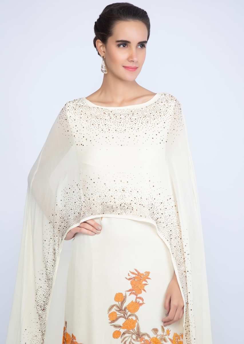 Off White Cape Tunic Dress With Contrasting Floral Print Online - Kalki Fashion