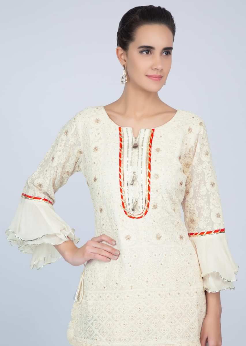 Off white chicken embroidered suit with  matching palazzo pant only on kalki