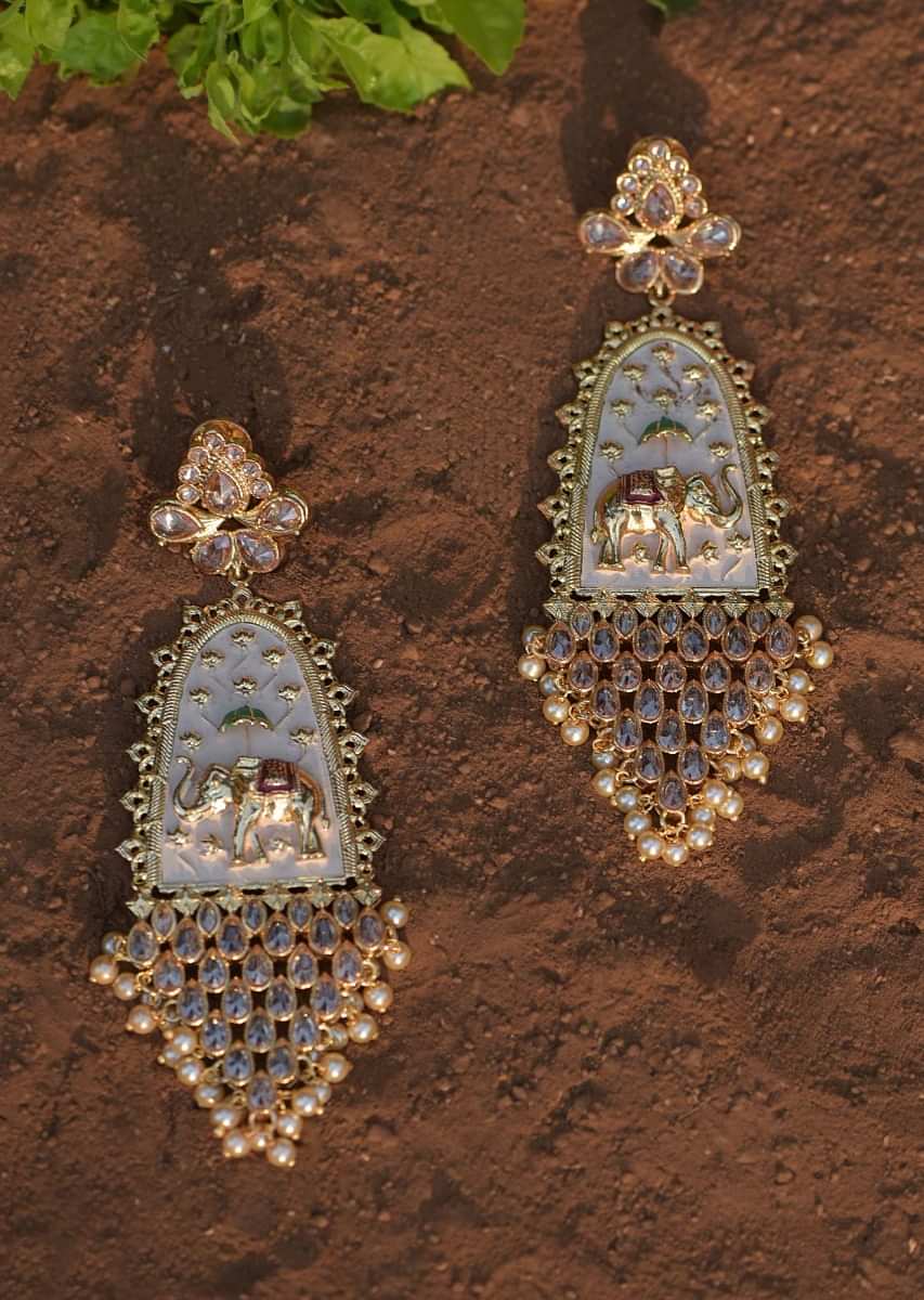 Off White Ethnic Earrings With Carved Elephant Motif, Crystals And Dangling Pearls Online - Kalki Fashion