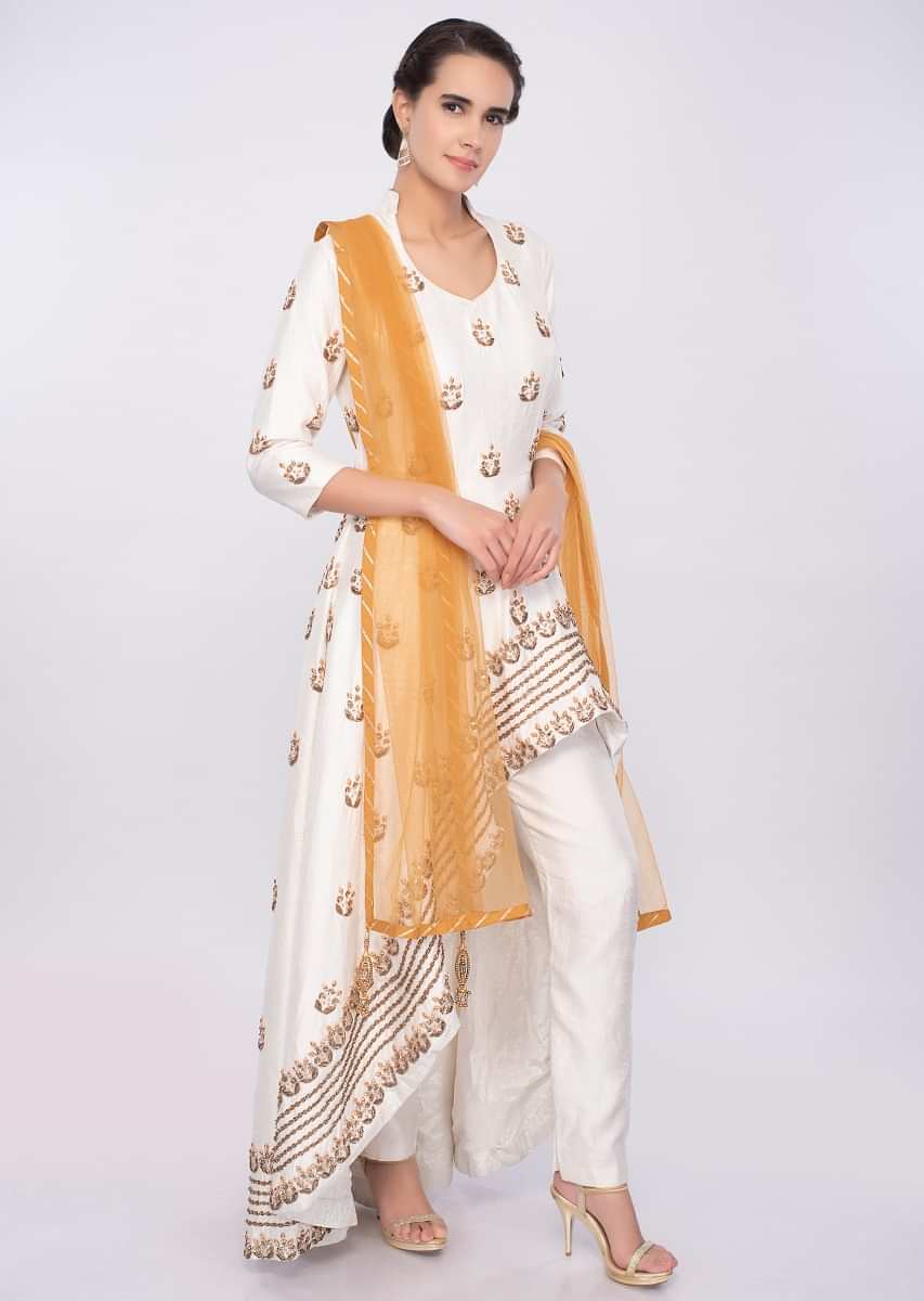 Off white front short back long embroidered suit with yellow net dupatta only on Kalki