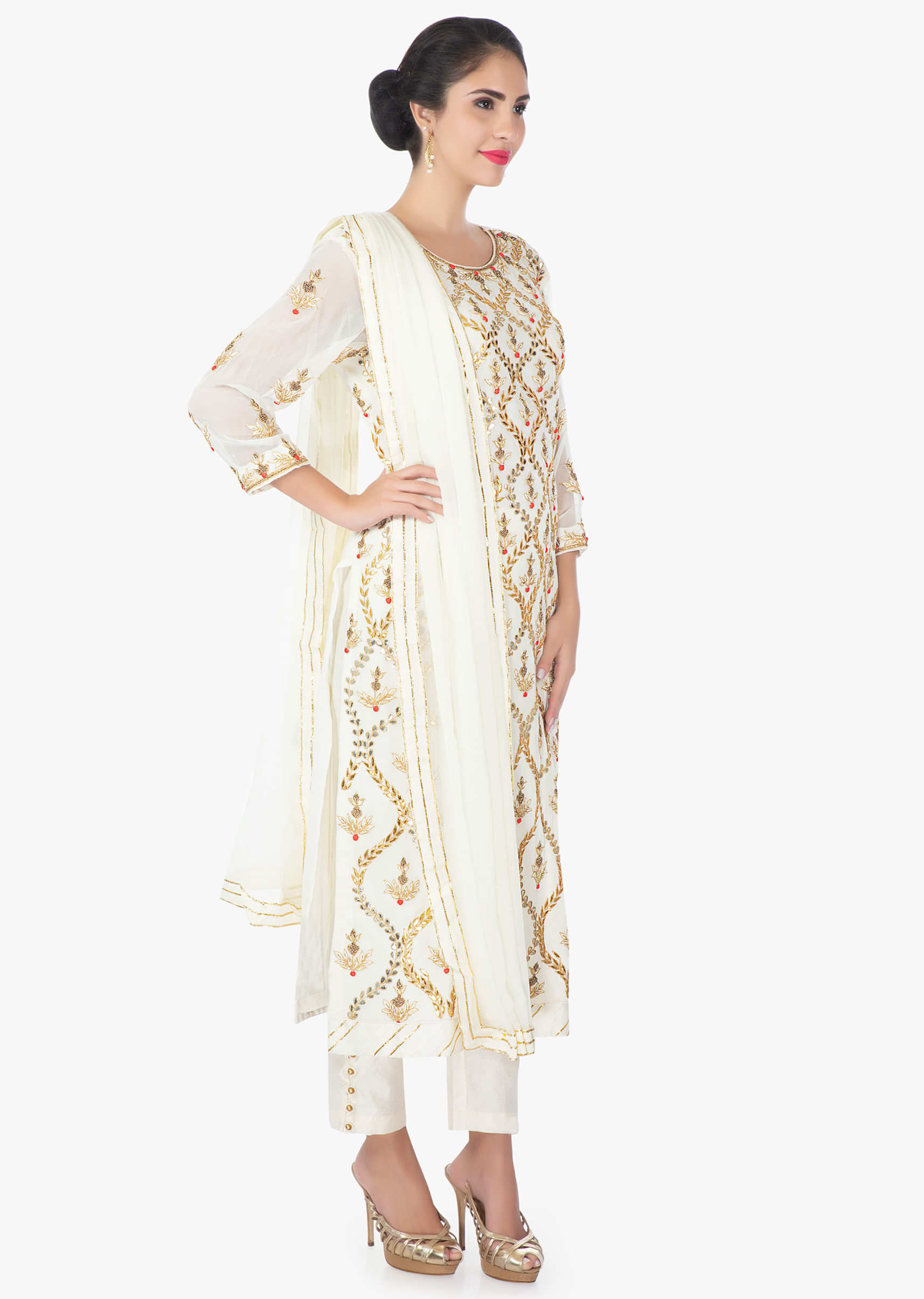 Off white georgette  suit with a straight pant and a chiffon dupatta 