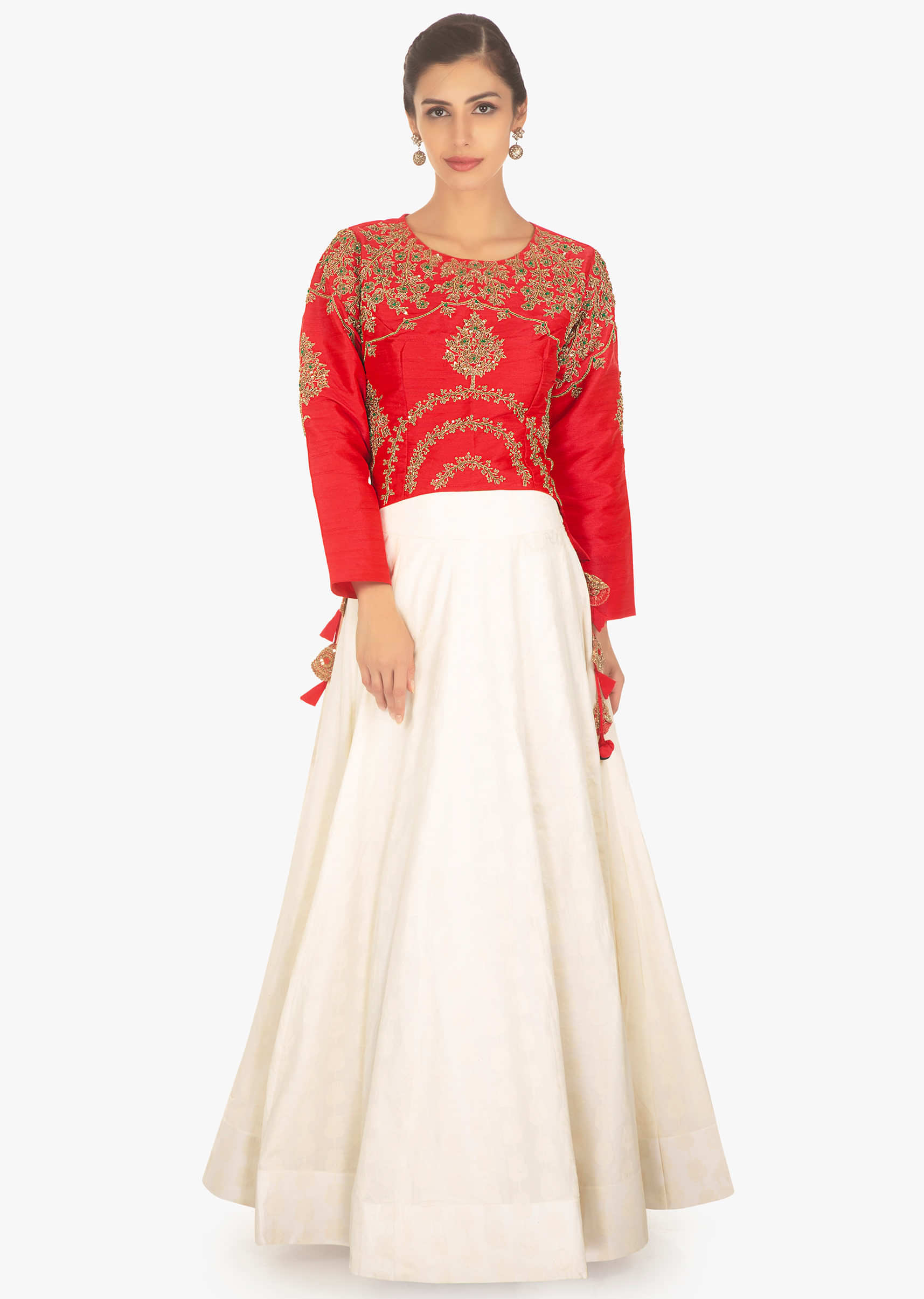 Off white jacquard lehenga paired with red top 