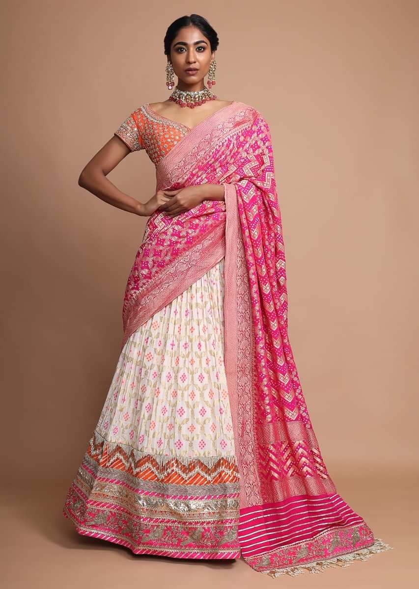 Red & Pink Bandhani Lehenga - Roopam Exclusive Designer Indian Wear For  Women & Men Designer Ladies Ethnic Wear For Indian Weddings & Festivals.