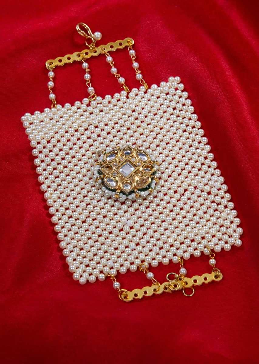Off white pearl base bracelet with kundan broach only on Kalki