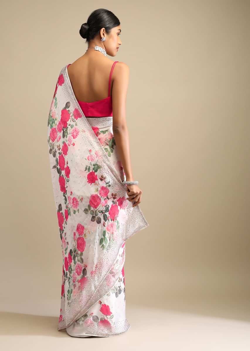 Off White Saree In Crepe With Floral Print All Over And Multi Colored Kundan Accents Along The Border  