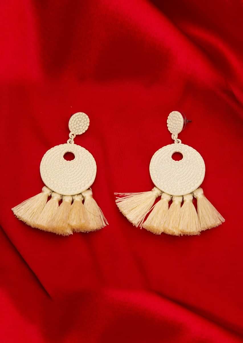 Off white self carved  earrings with thread tassels