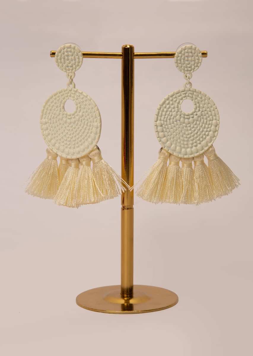 Off white self carved  earrings with thread tassels