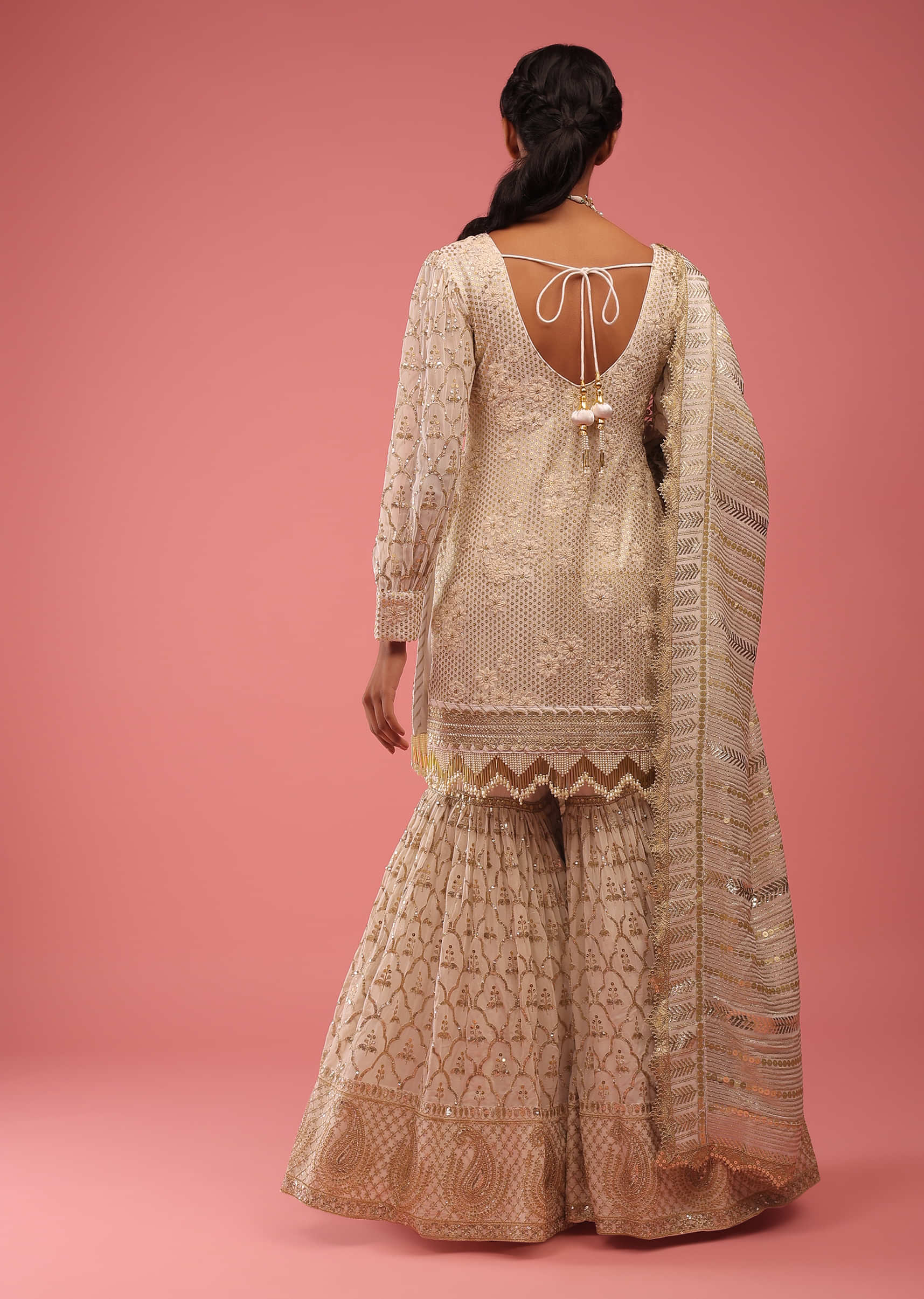 Off-White Sharara Suit With Golden Zari Embroidery With Fringes