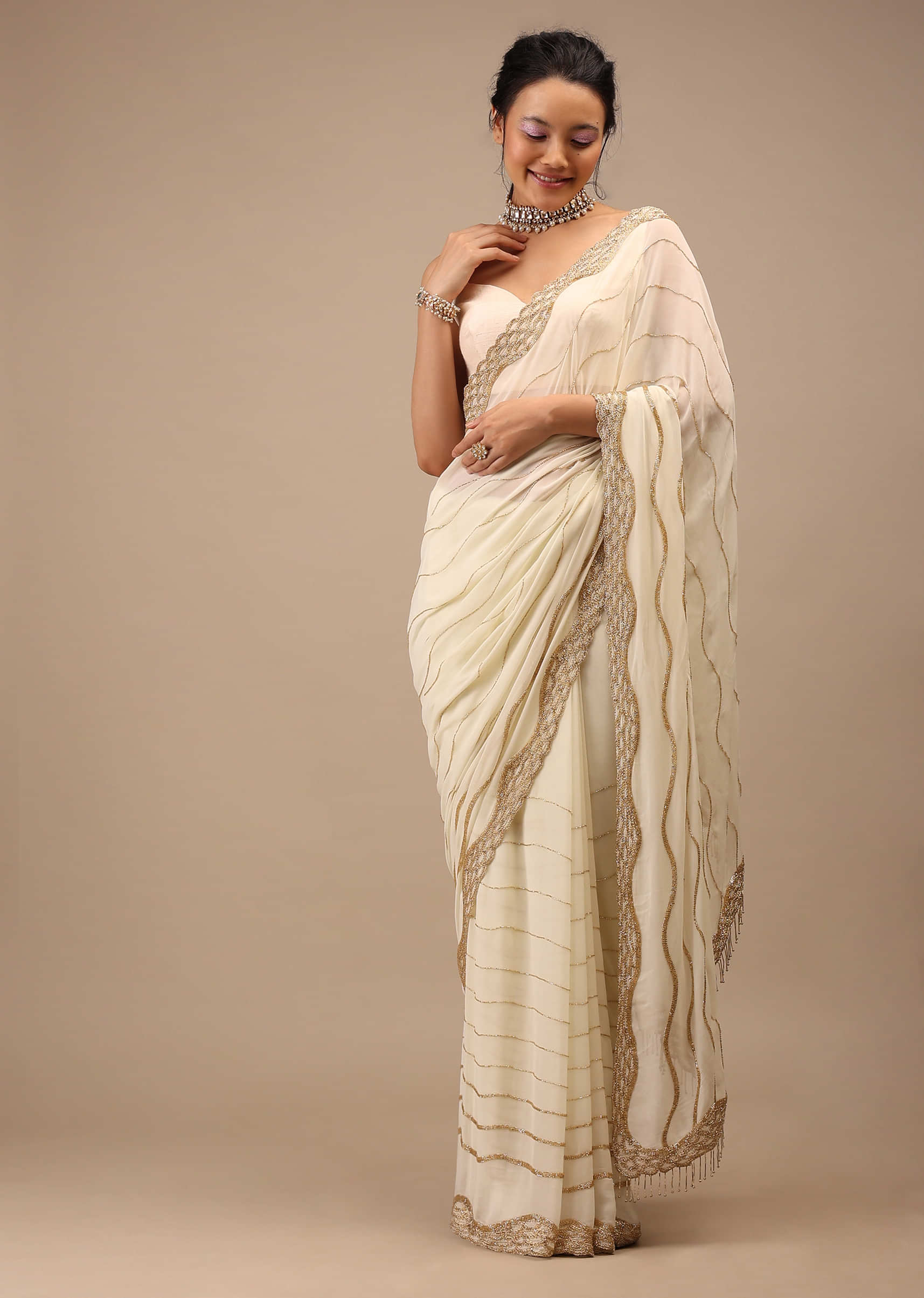 Off White Georgette Saree With Cut Dana Zardosi Embroidery Along With Copper Detailing 