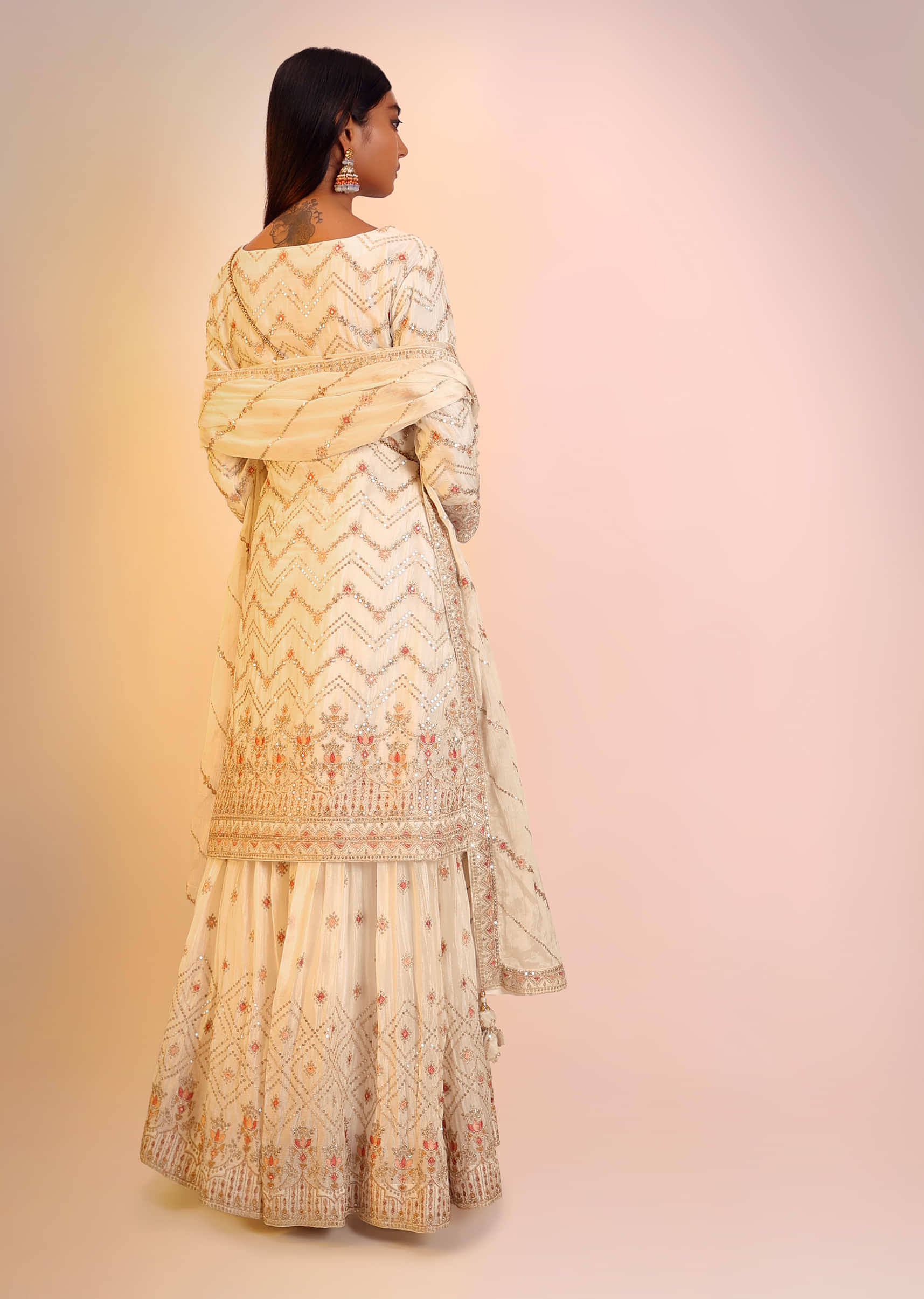 Off White Sharara Suit In Chinon Chiffon With Multi Colored Resham And Zari Embroidered Chevron Design