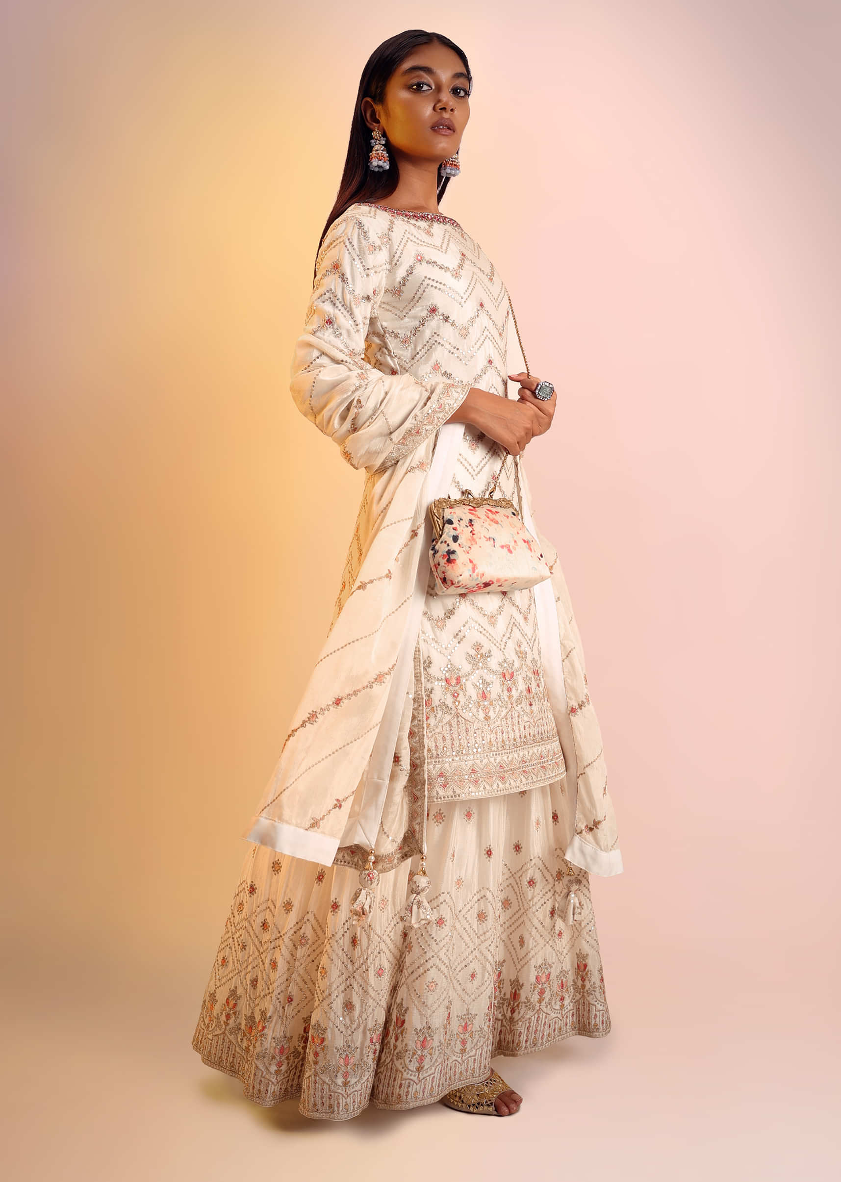 Off White Sharara Suit In Chinon Chiffon With Multi Colored Resham And Zari Embroidered Chevron Design