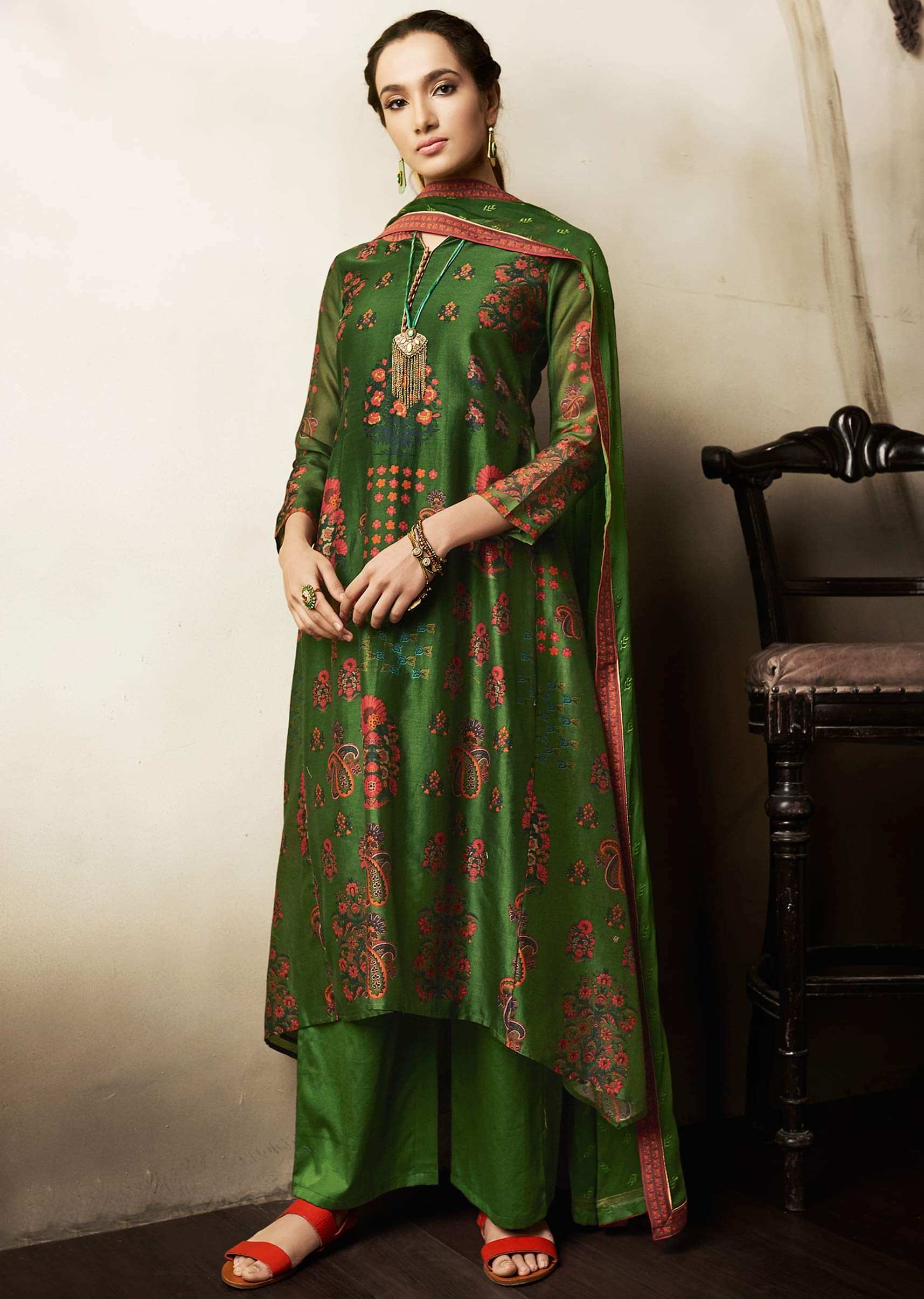 Olive green unstitched suit in cotton with floral butti and printed neckline