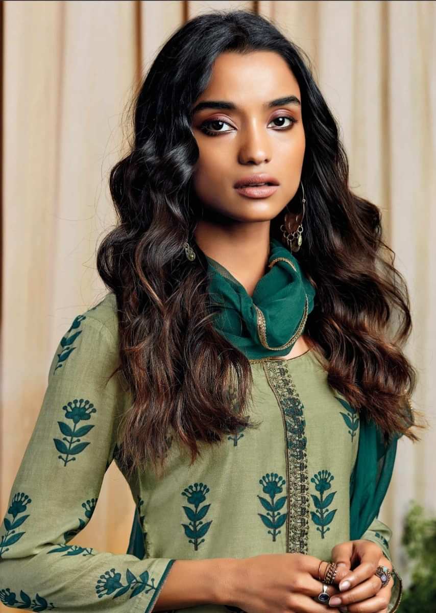 Olive green unstitched suit with thread and zari embroidered butti and placket