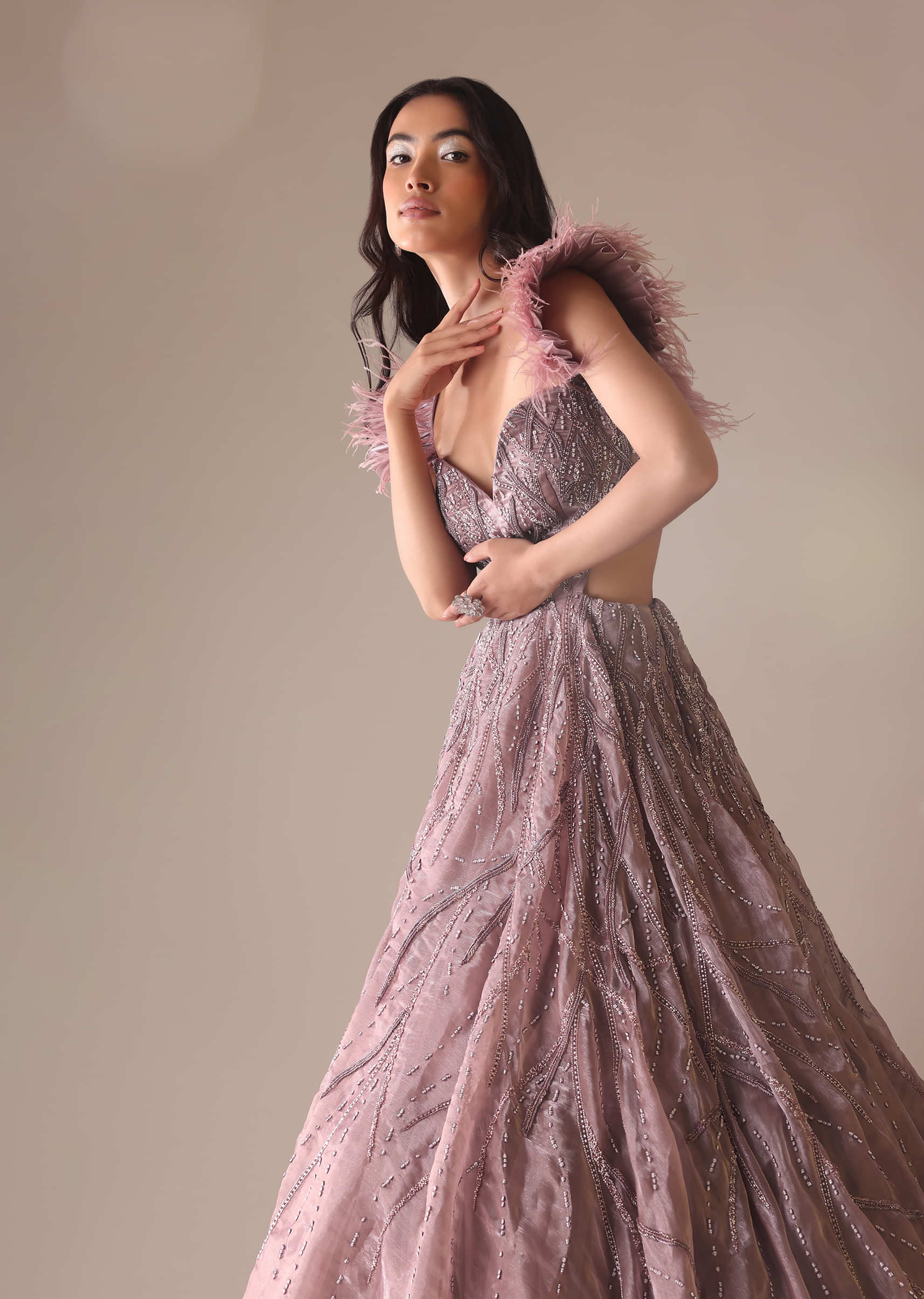 Onion Pink Bridal Gown With Feathered Sleeves And Heavy Embroidery