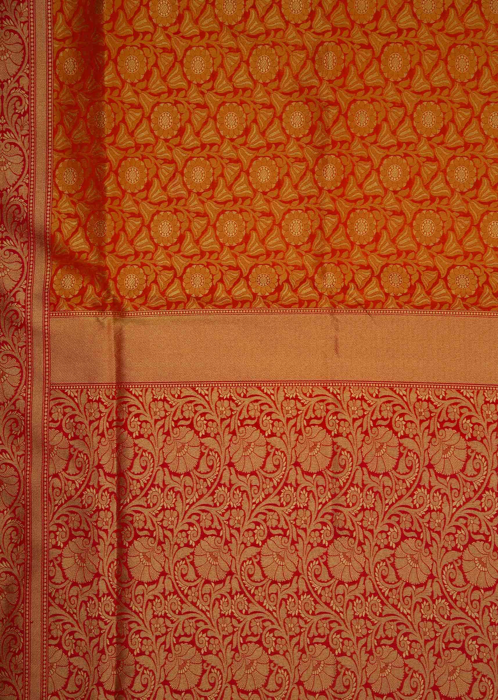 Orange brocade saree in floral motif
