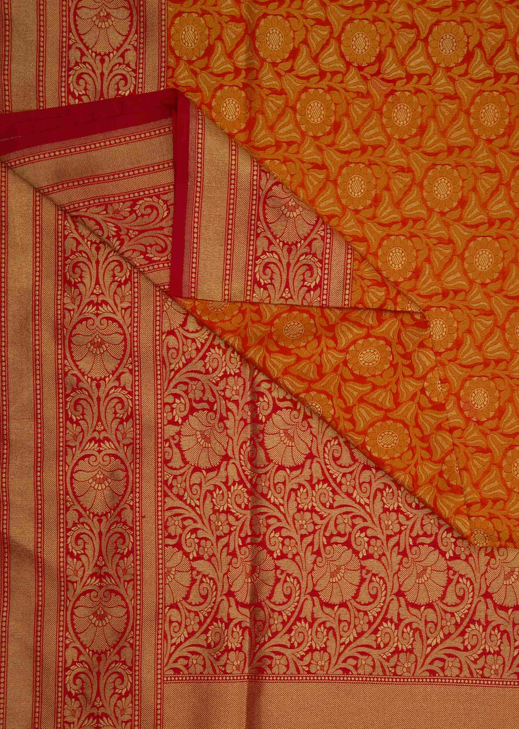 Orange brocade saree in floral motif