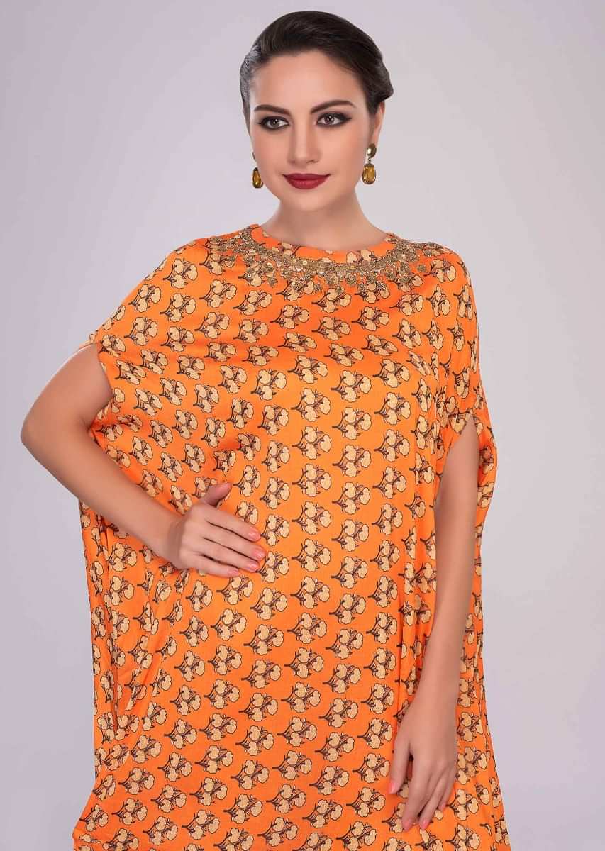Orange fancy cotton tunic with floral printed butti
