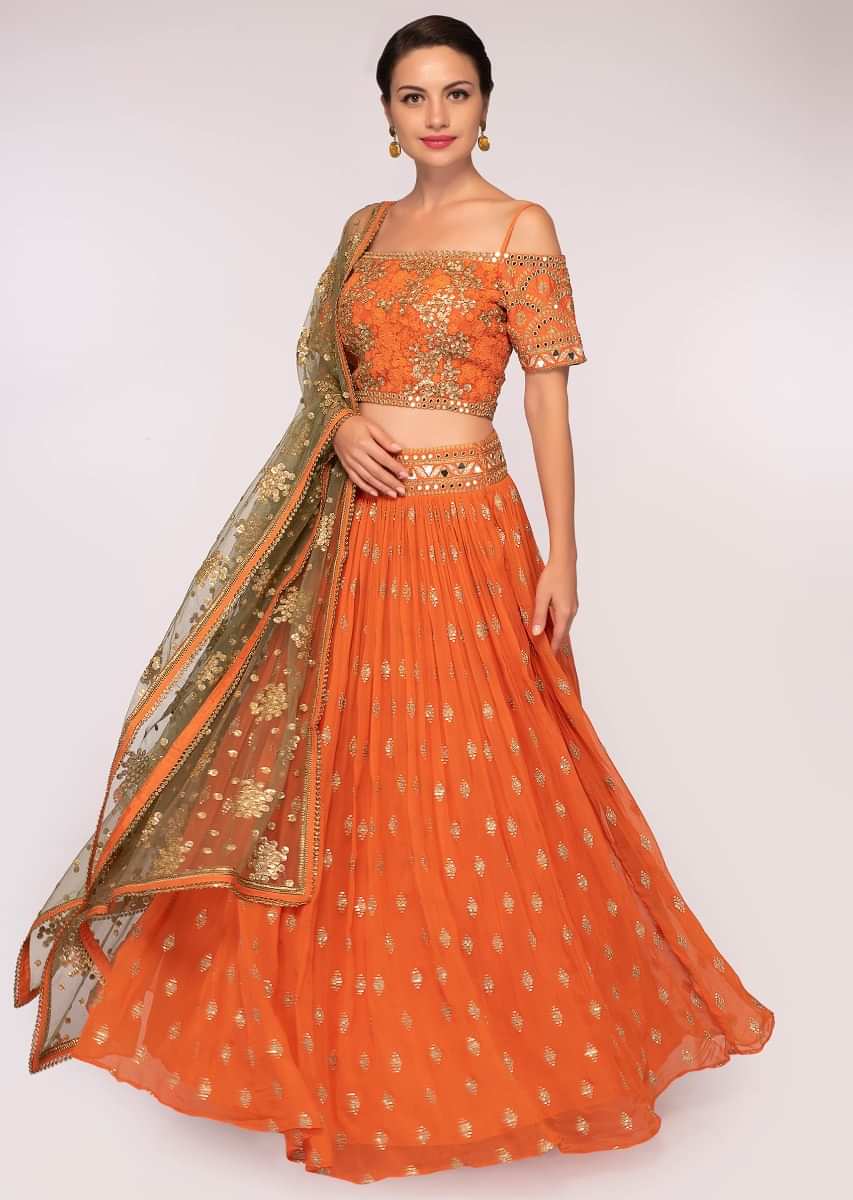 Orange georgette lehenga set with sequins and zari embroidery and butti