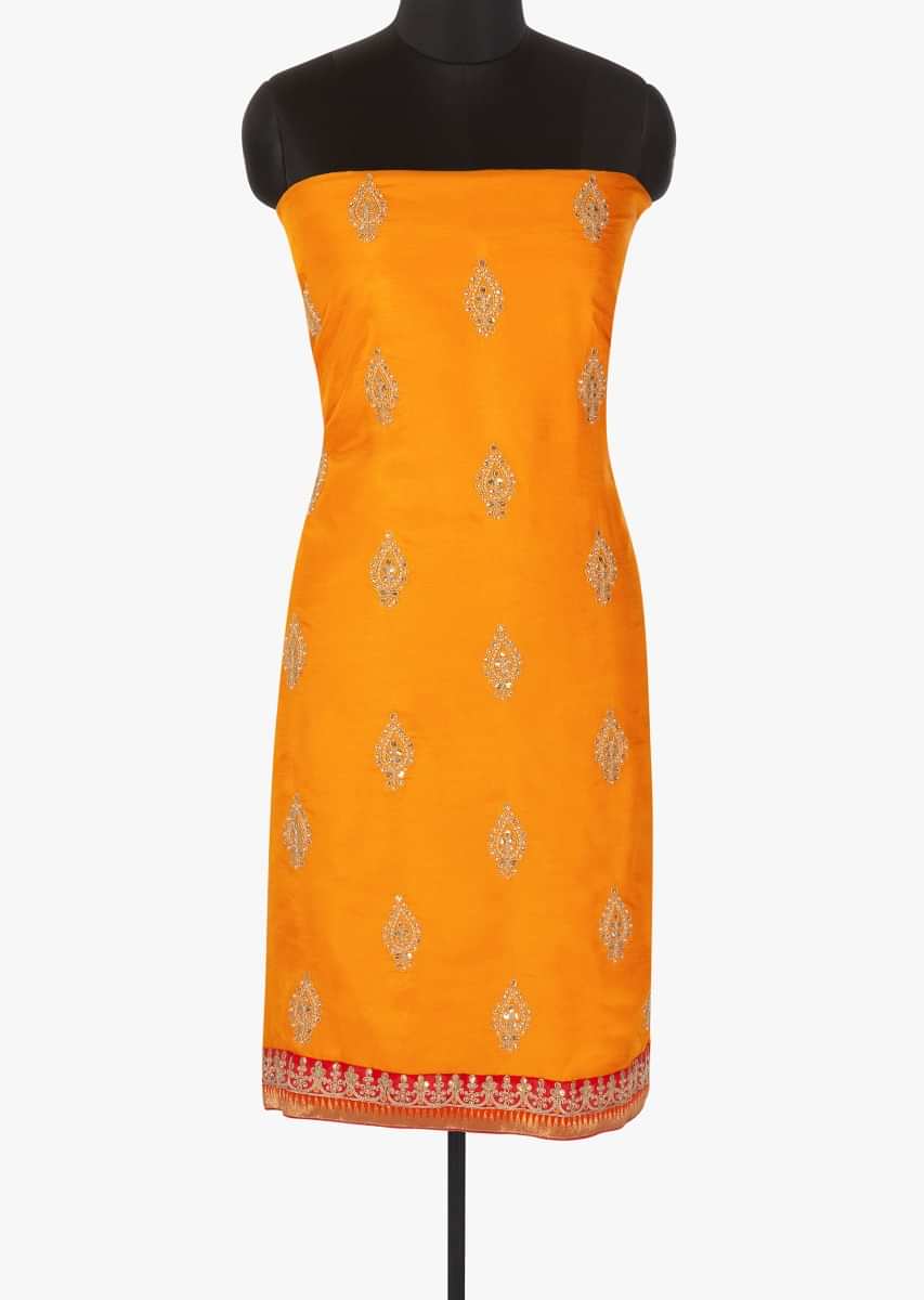 Orange unstitched top in embroidered butti with shaded dupatta only on Kalki