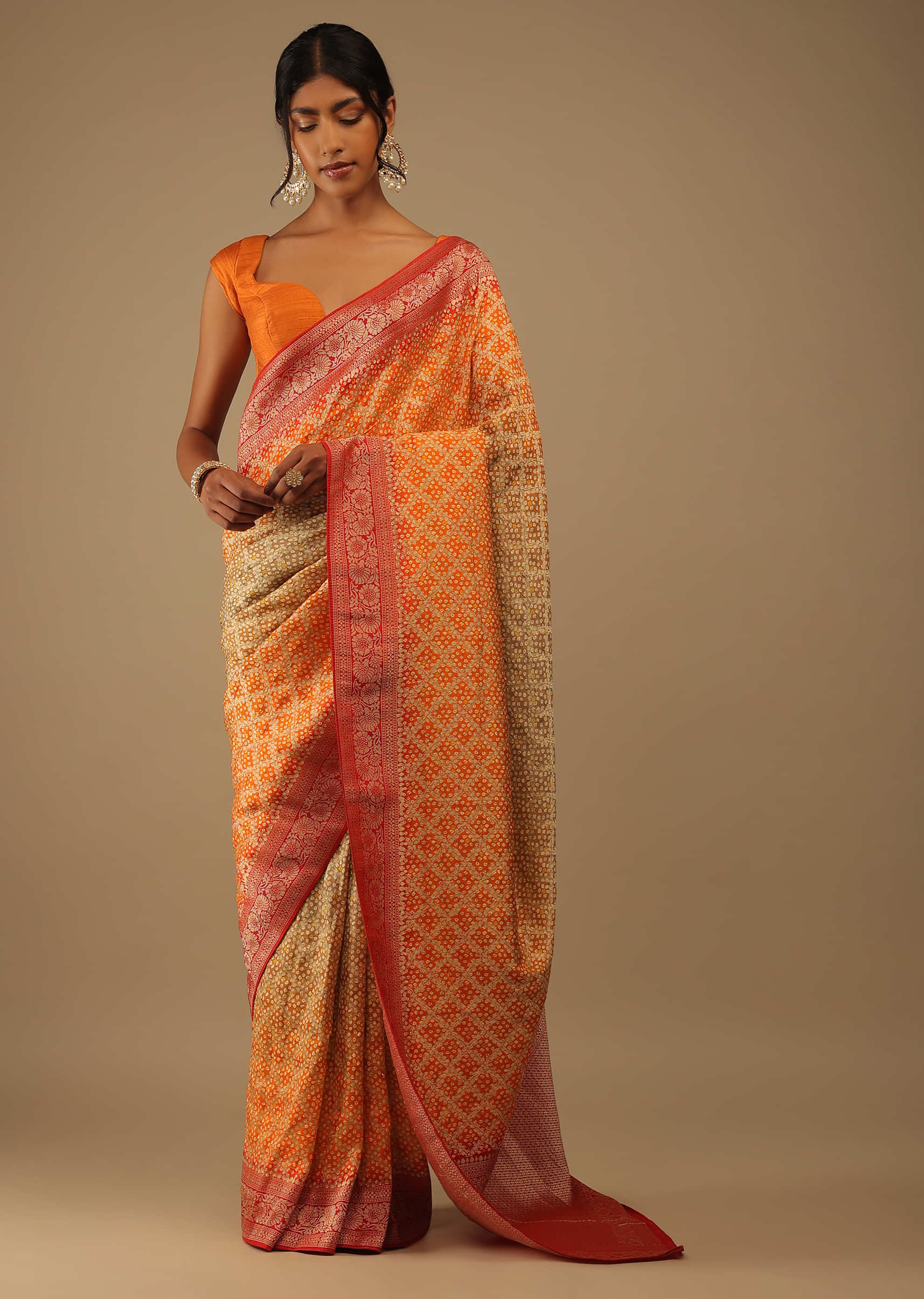 Orange And Cinnamon Color Saree In Bandhani Print, Crafted In Silk With Zari Embroidery