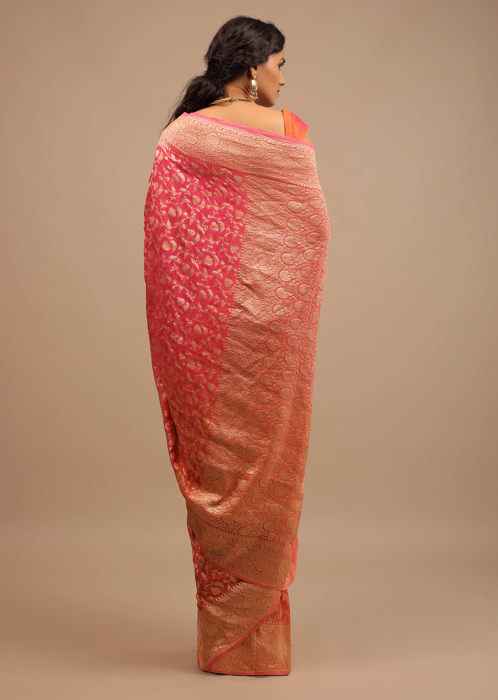 Orange Peach Traditional Saree Made With Georgette And Beautified With Golden Jaal 