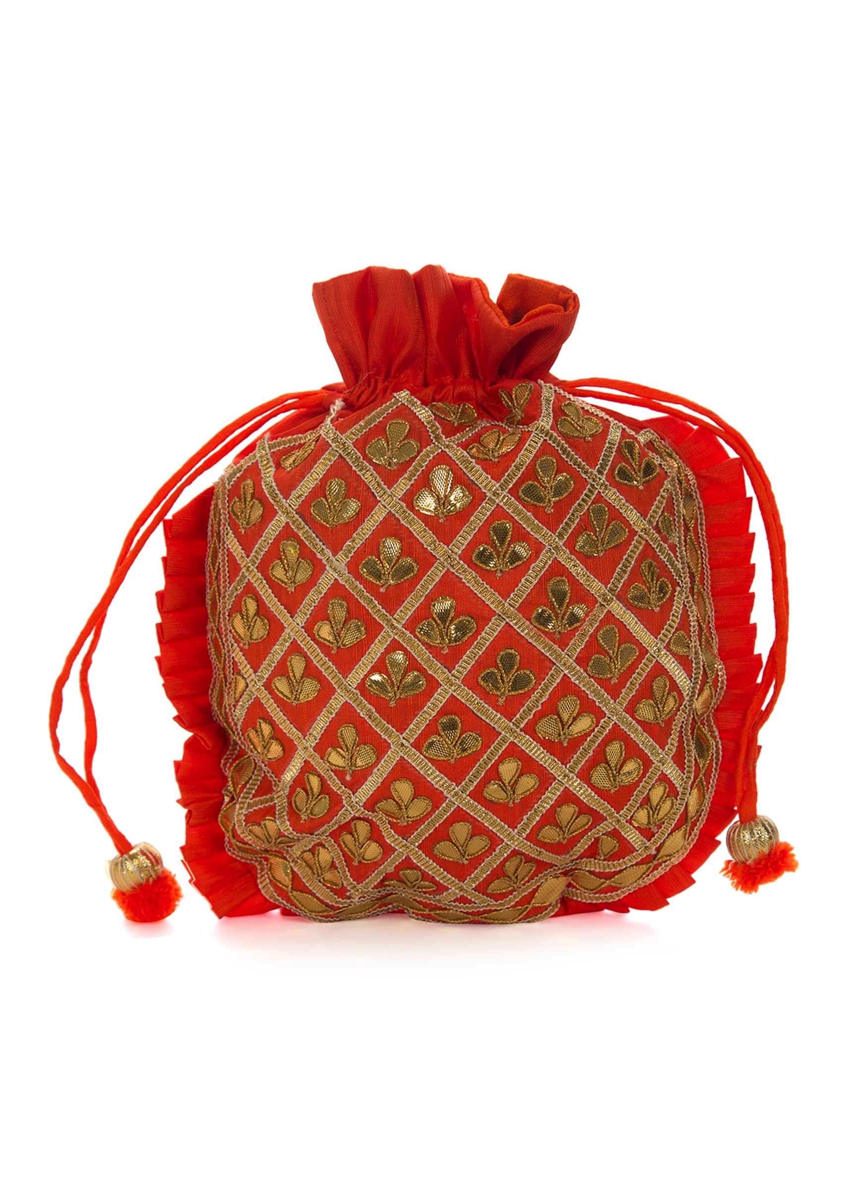 Orange potli bag beautified in gotta patti embroidered work only on Kalki