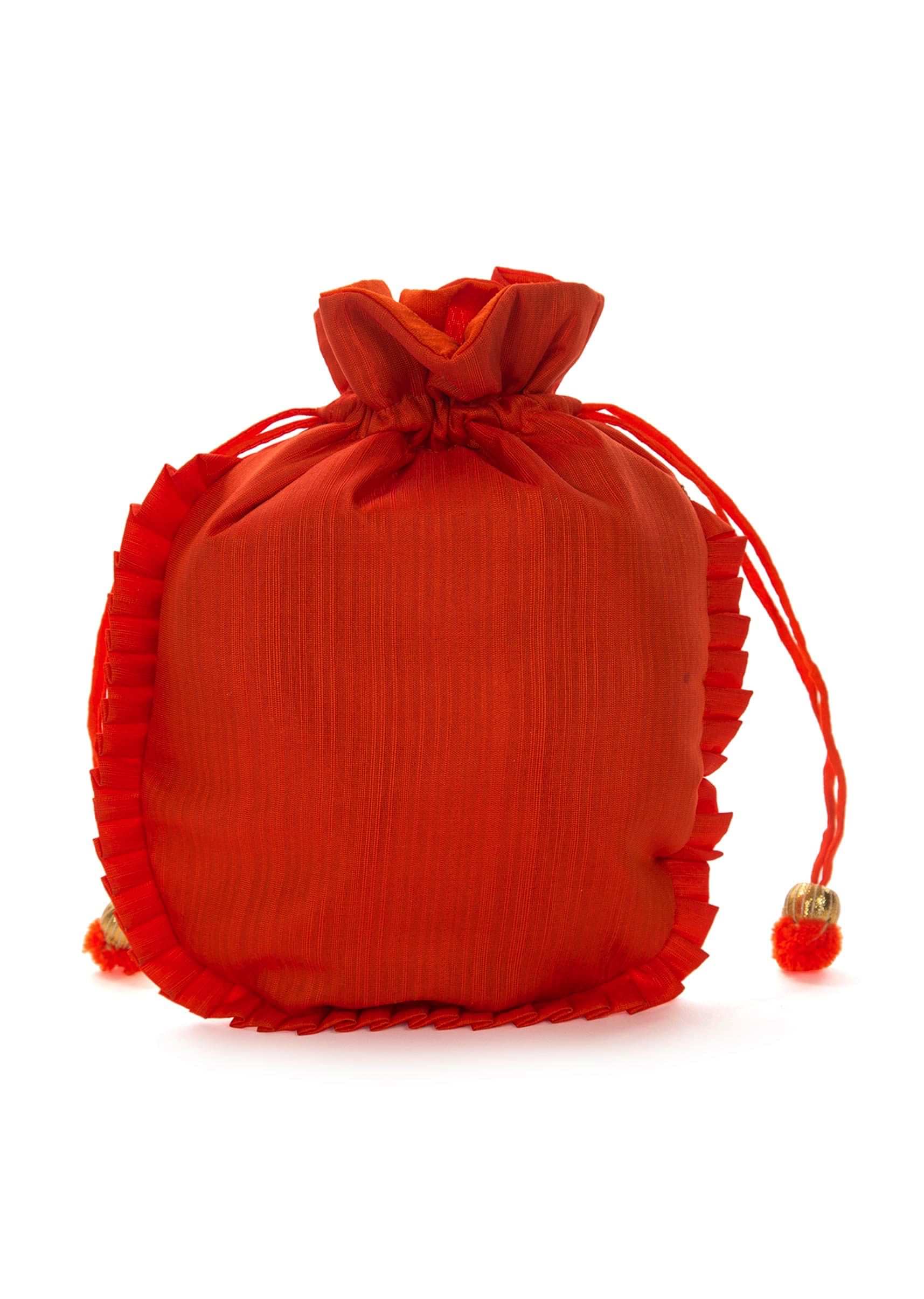 Orange potli bag beautified in gotta patti embroidered work only on Kalki