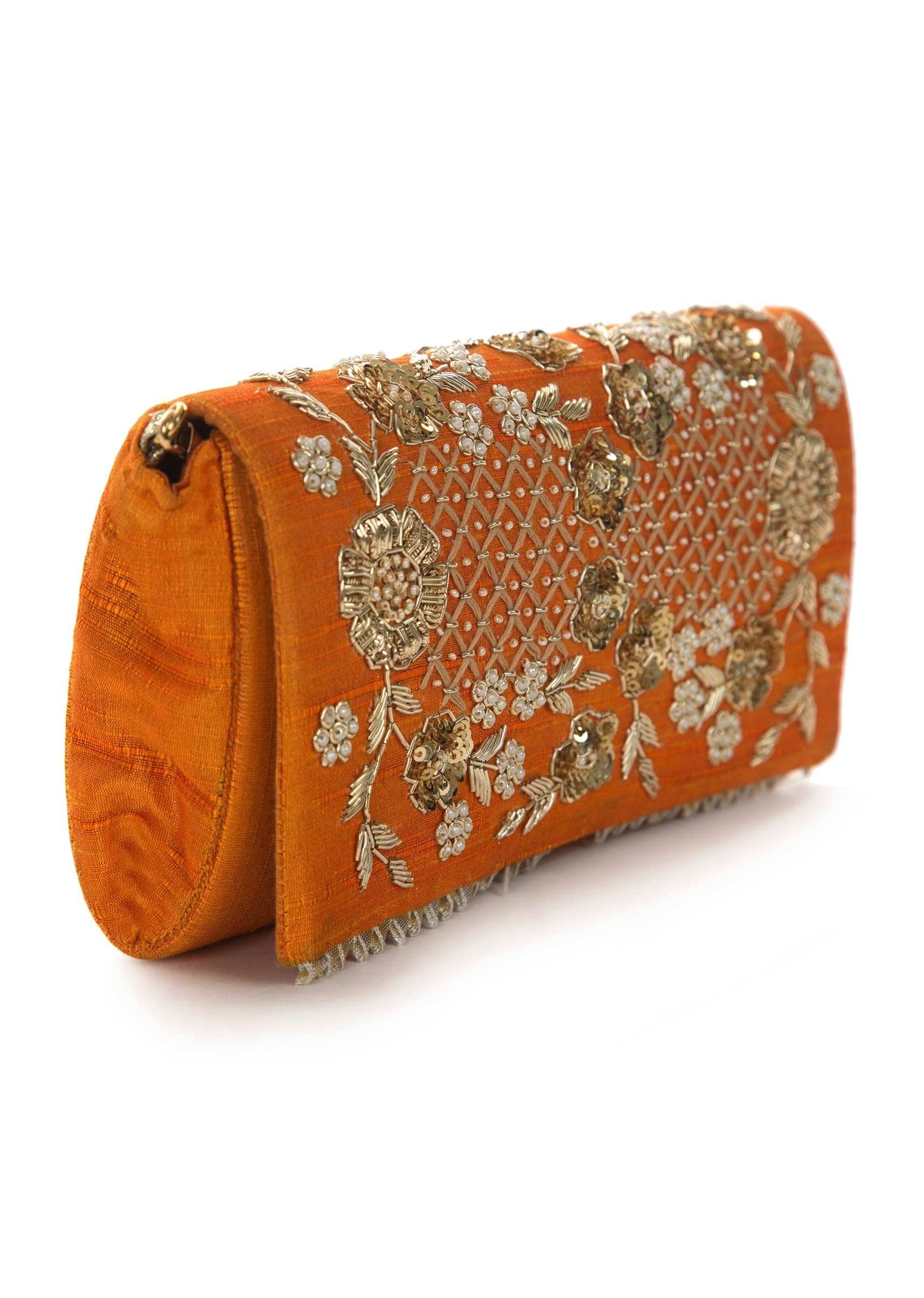 Orange sling bag embroidered in zari and sequin work only on Kalki