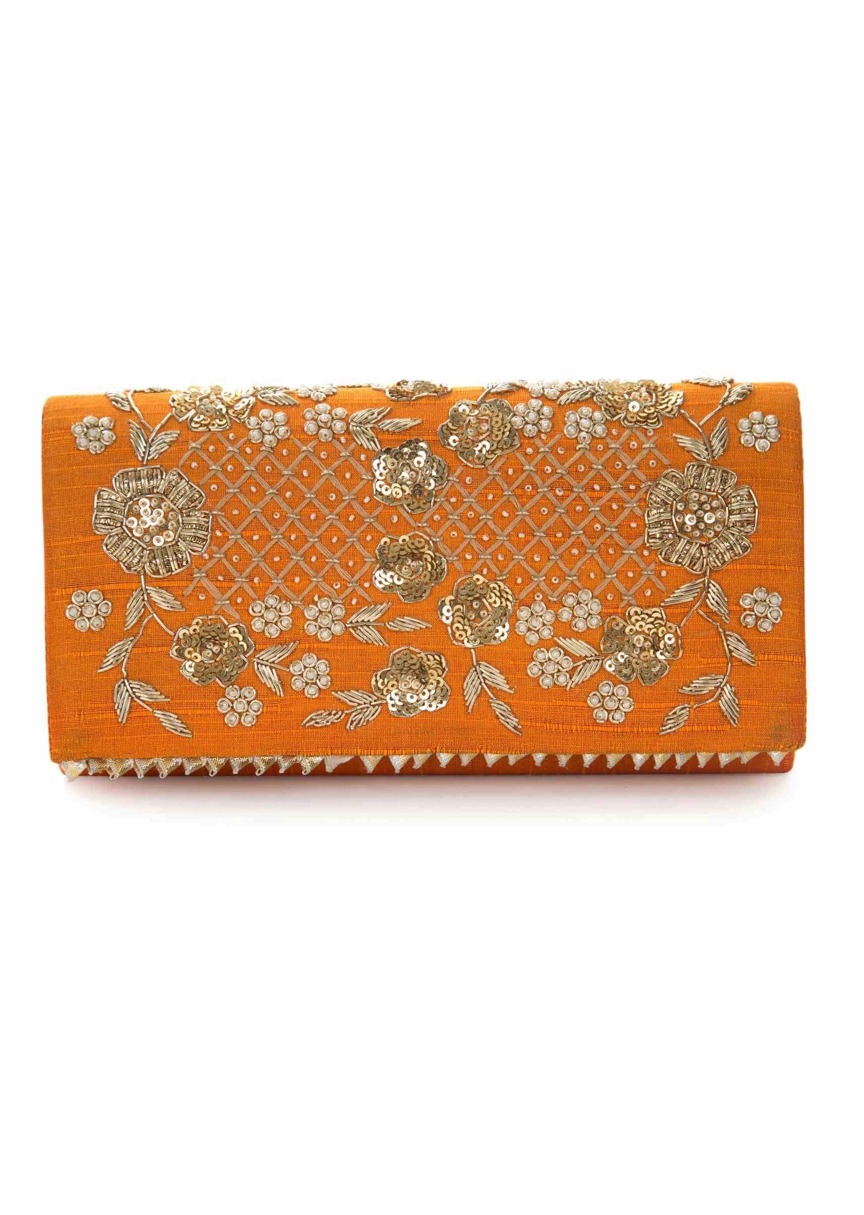 Orange sling bag embroidered in zari and sequin work only on Kalki